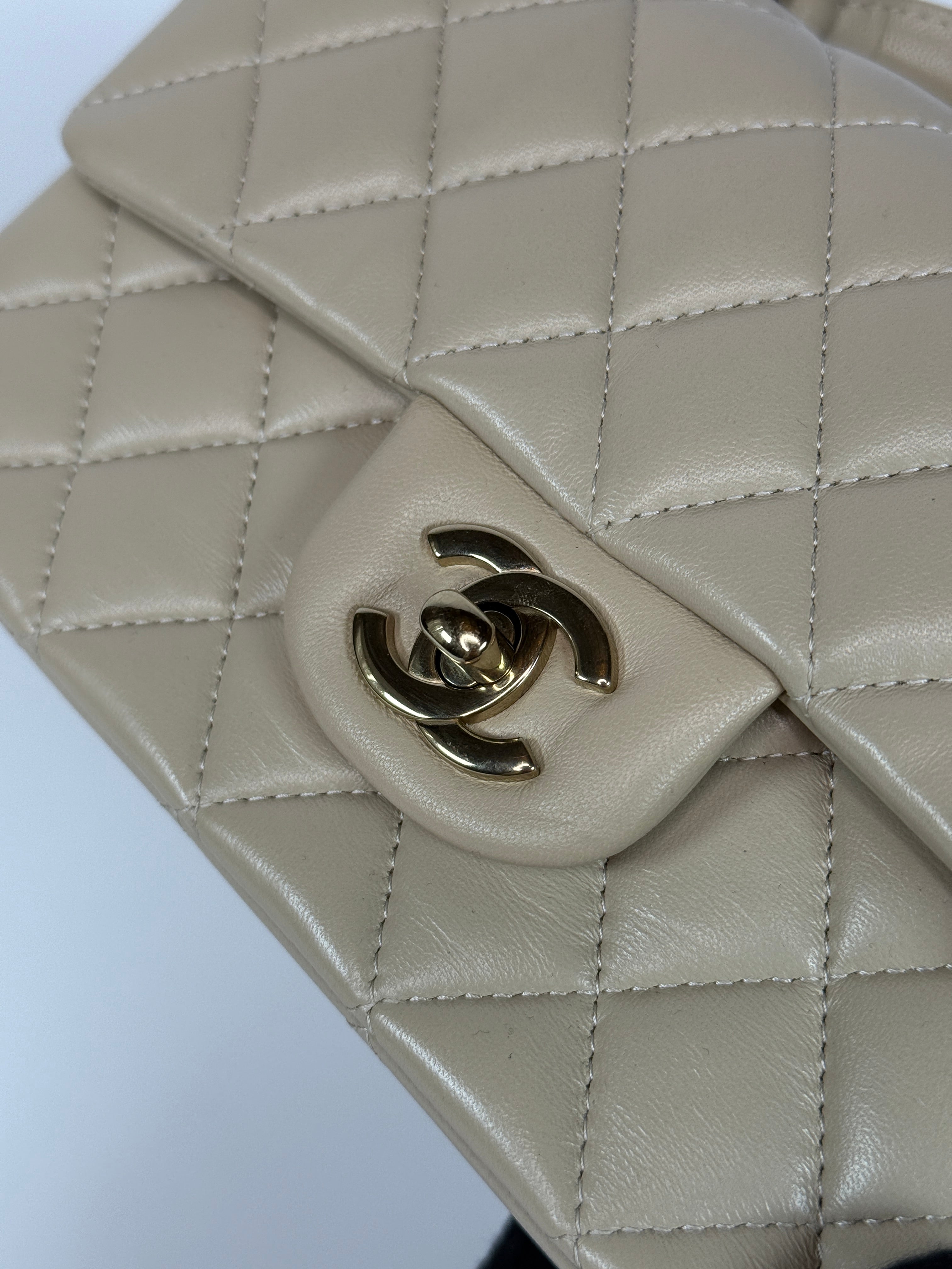 Authentic and preloved Chanel Mini Rectangle Top Handle In Ecru Lambskin With Gold Hardware in excellent condition, Fully insured next day delivery. Verified by Luxe Cheshire. 100% Authenticity guarantee,