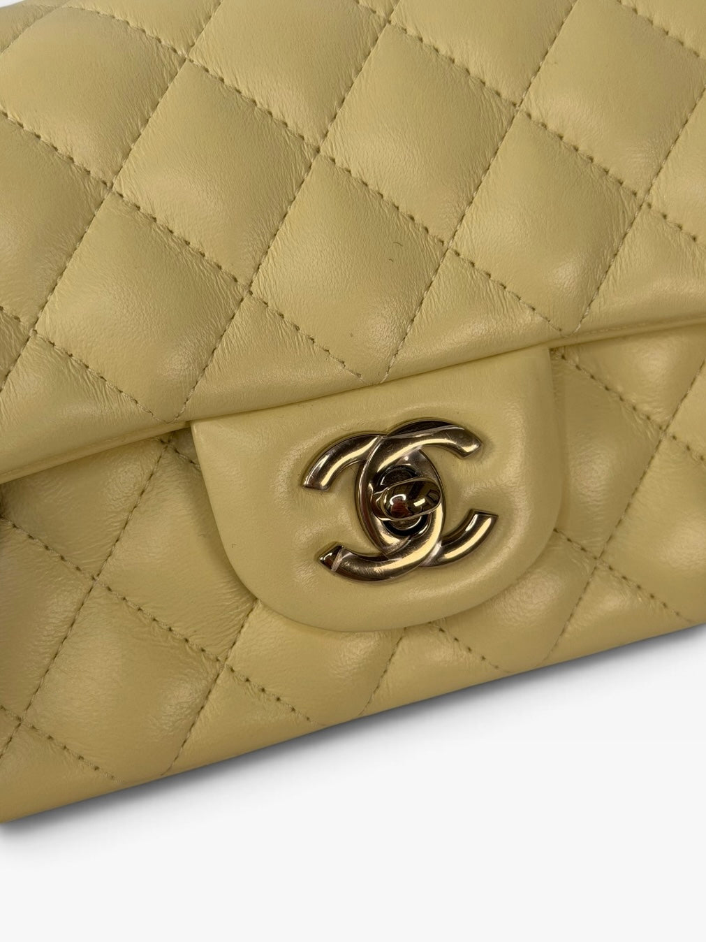 Chanel Mini Rectangle In Yellow Lambskin Leather With Gold Hardware. 100% authentic and preloved in excellent condition