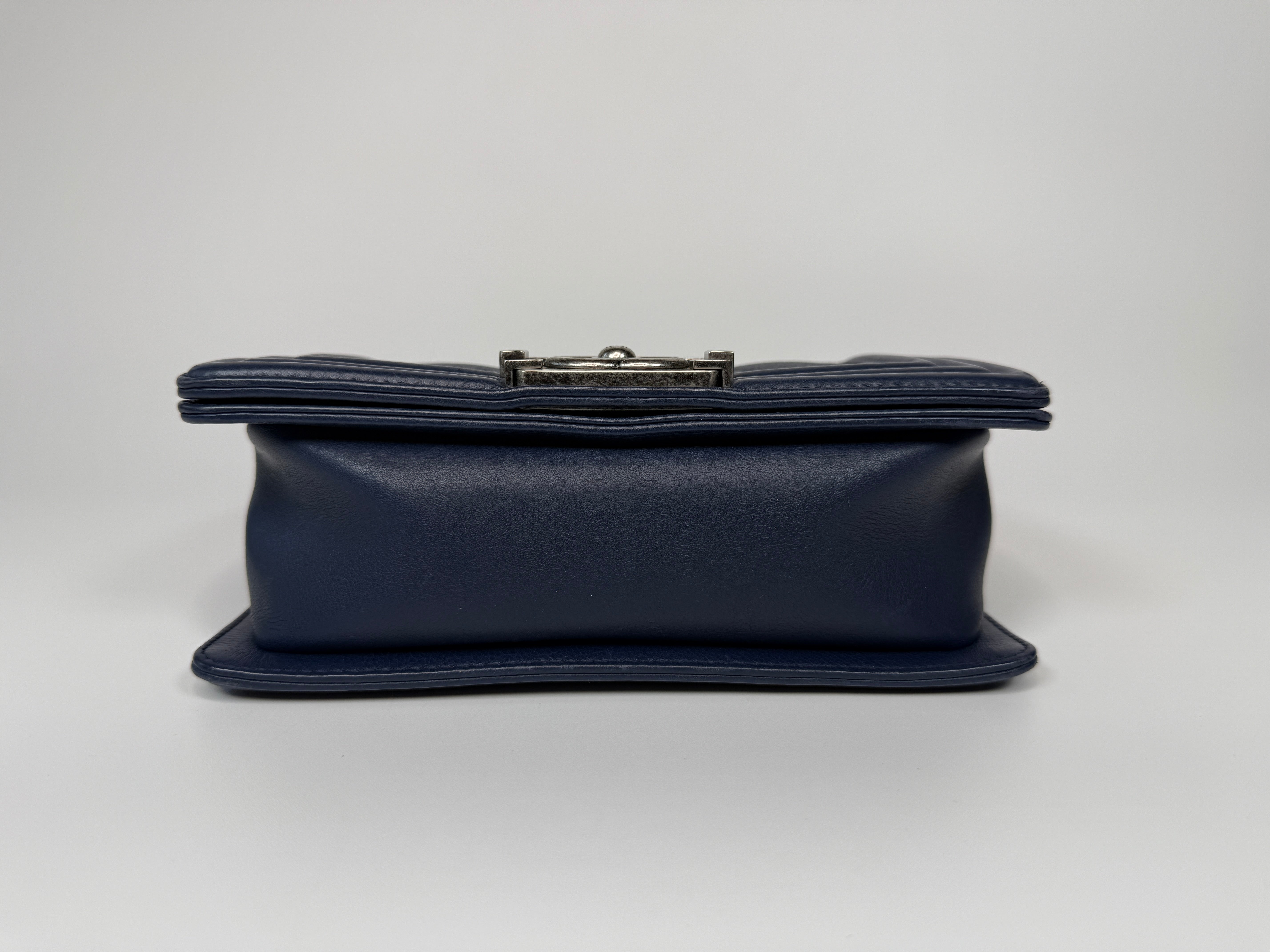 Chanel Mini Boy Bag In Navy Lambskin With Ruthenium Hardware In Excellent Condition.
Authentic Pre Loved Verified by Luxe Cheshire Trusted Designer resale 