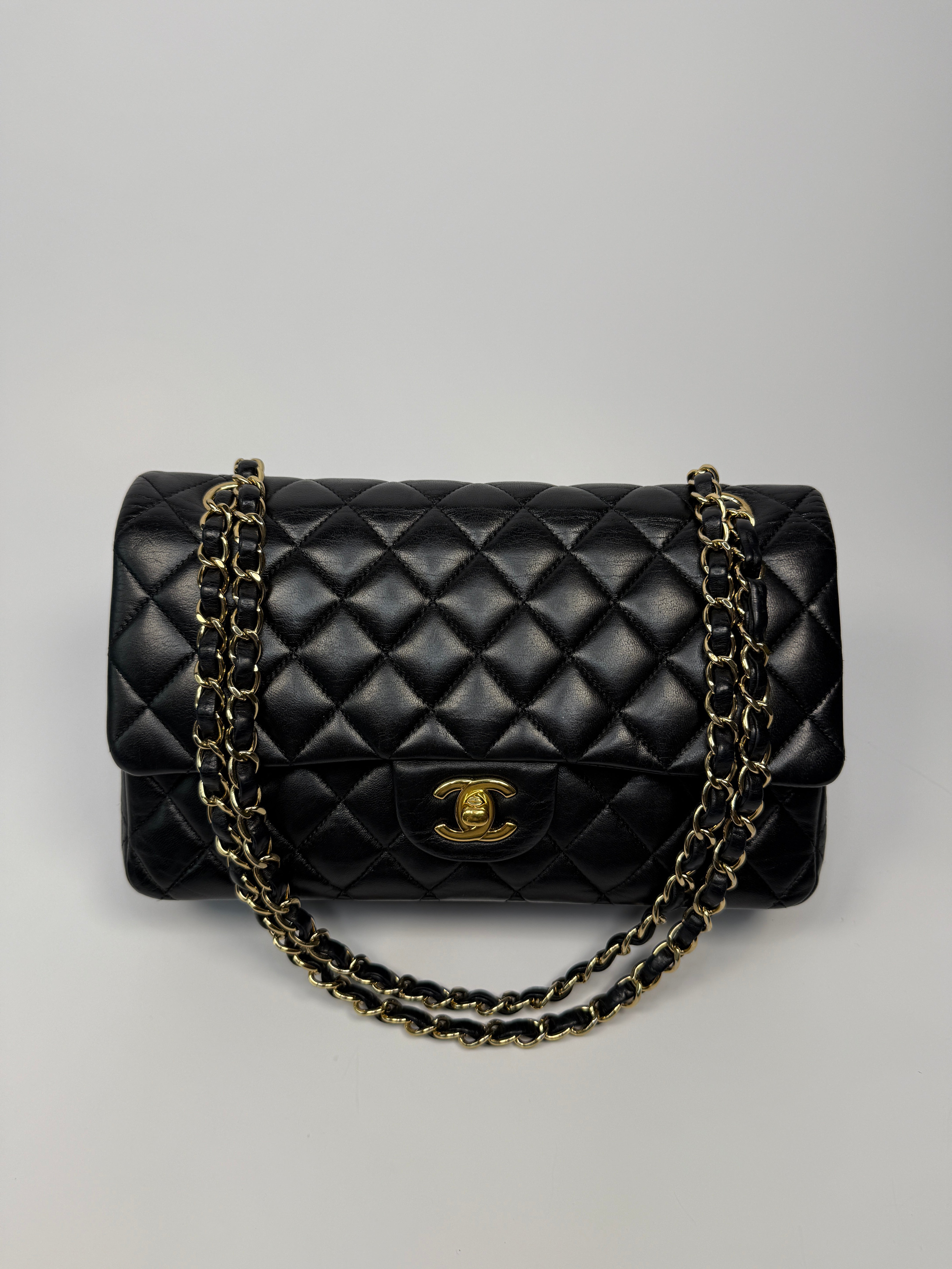 Chanel Medium Classic Double Flap Black Lambskin With Gold Hardware
Pre Loved & Authentic 