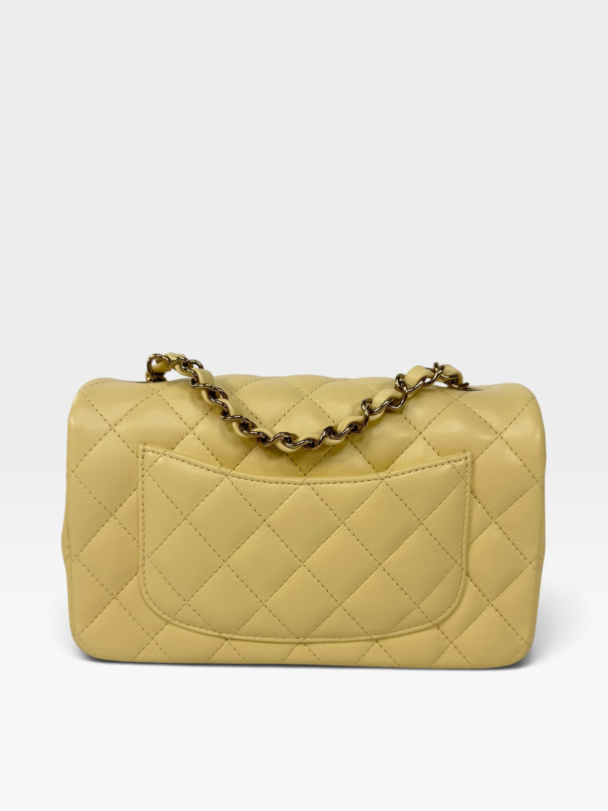 Chanel Mini Rectangle In Yellow Lambskin Leather With Gold Hardware. 100% authentic and preloved in excellent condition