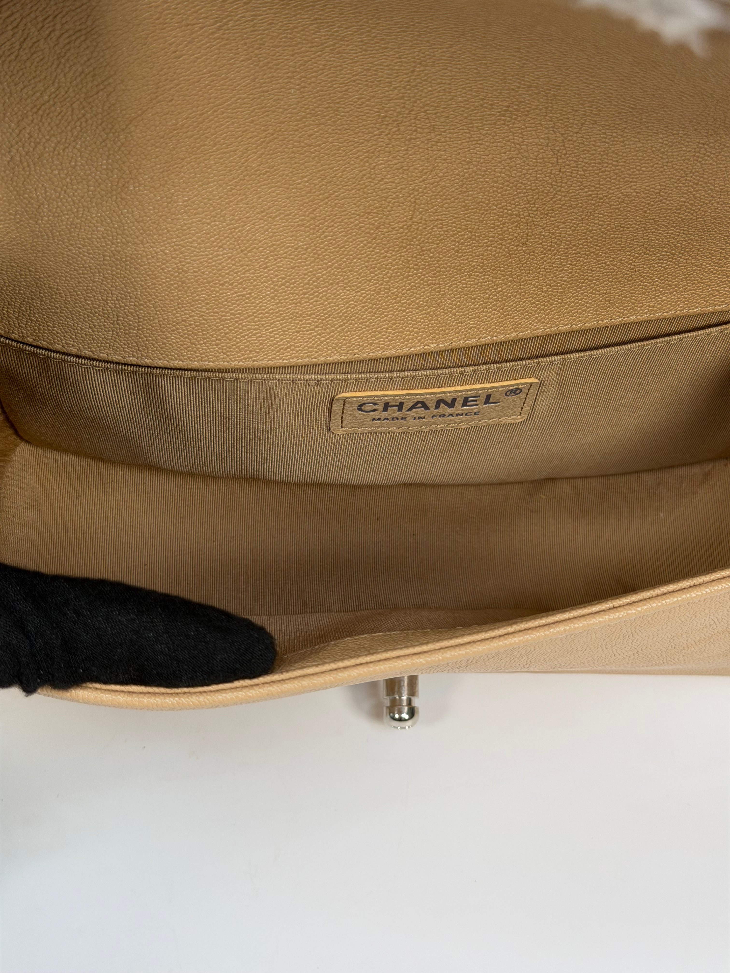 Chanel Medium Boy Bag Beige Caviar With Silver Hardware. Authentic and preloved in excellent condition