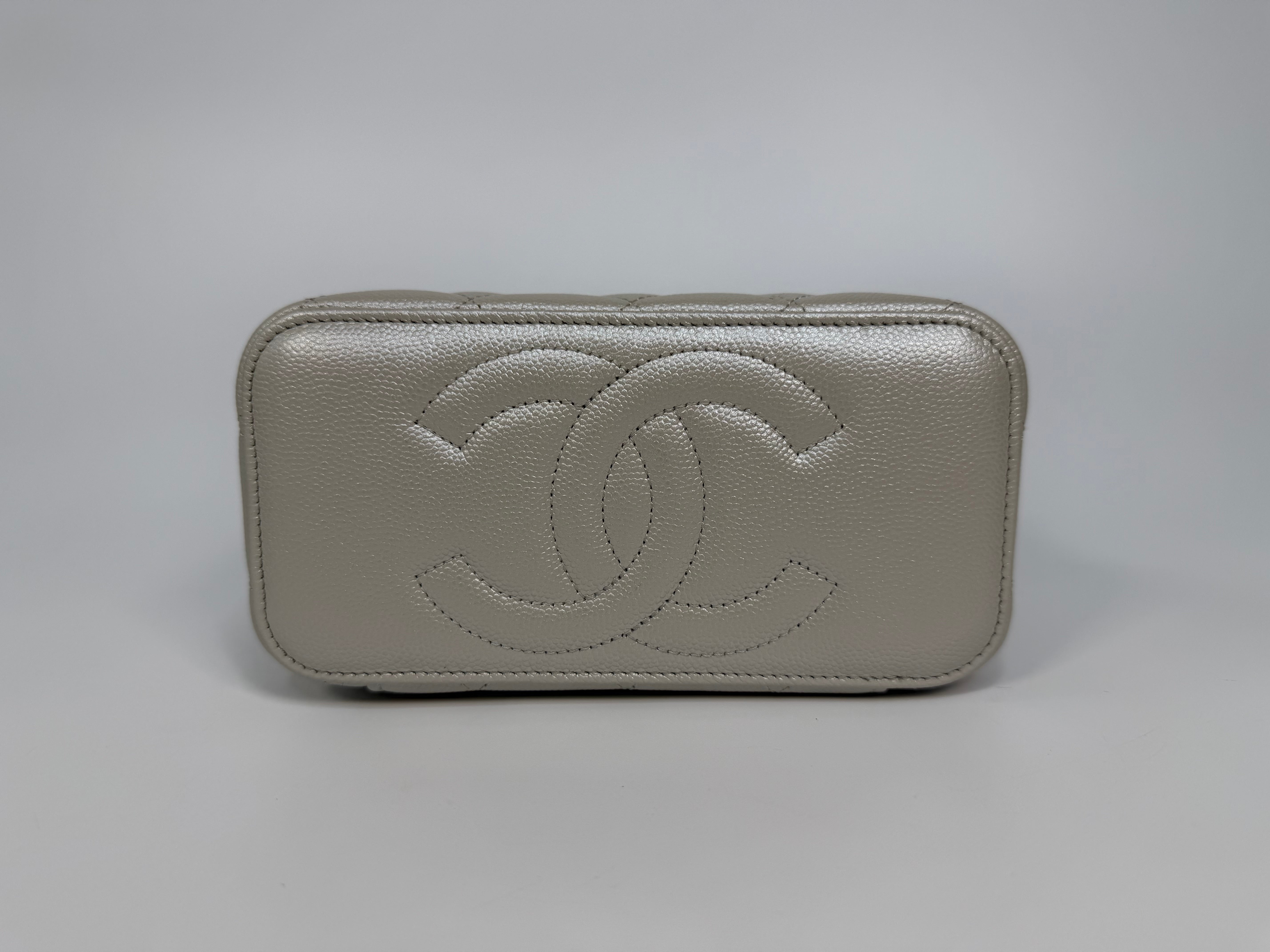 Chanel  Vanity In Light Pearl Grey Caviar Leather With Gold Hardware. Authentic and preloved in excellent condition.