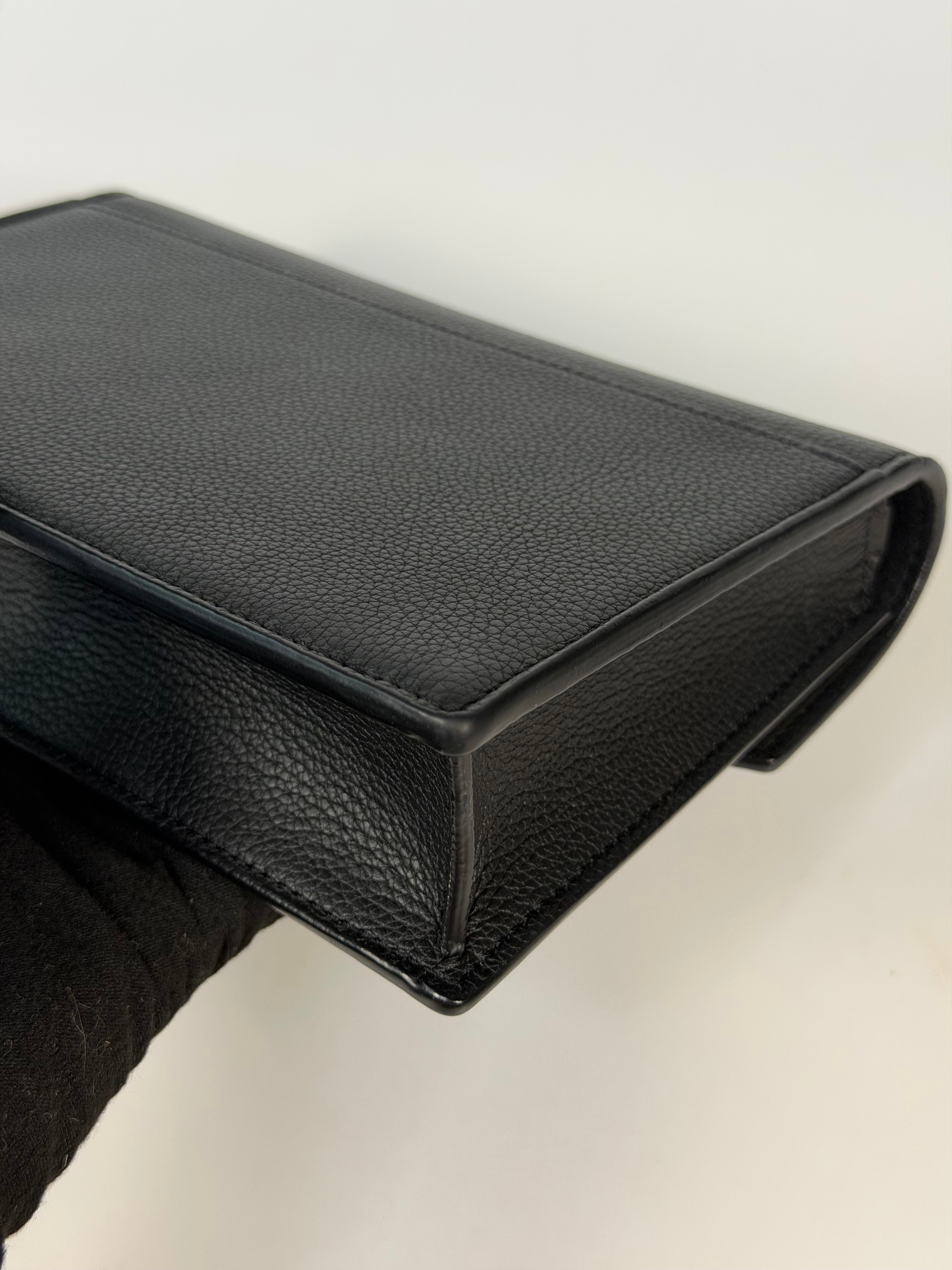 Louis Vuitton Pochette Chain MyLockMe In Black Leather With Silver Hardware in excellent condition 100% authentic and preloved 