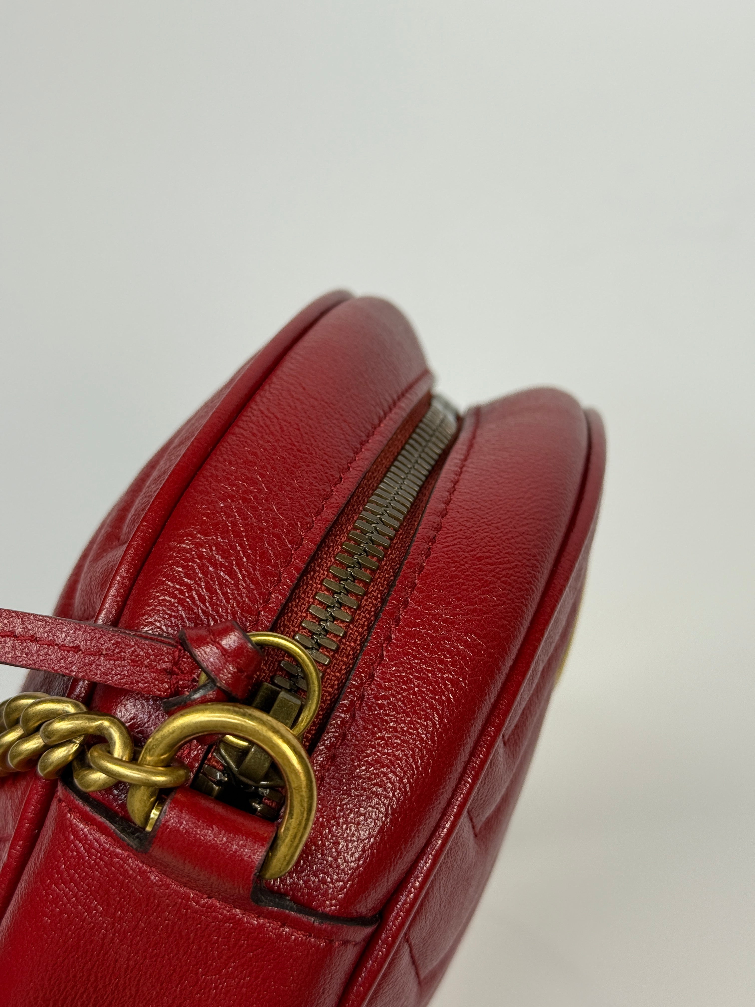 Gucci GG Marmont Round Shoulder Bag In Red Leather, very good condition. Authentic and preloved. 100% Authenticity guarantee