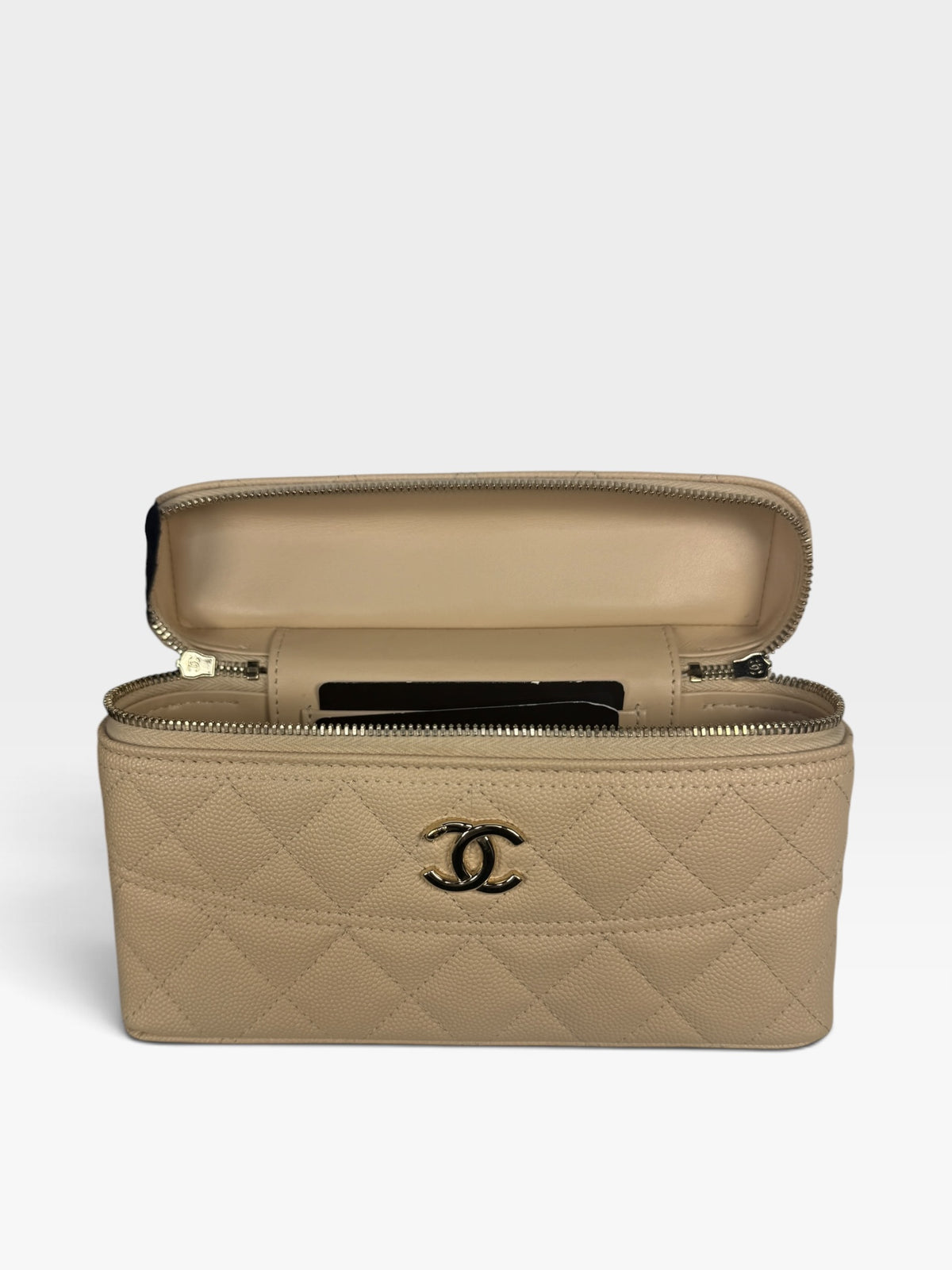 Chanel Flat Vanity In Beige Caviar Leather With Gold Hardware. 100% authentic and pre loved in excellent condition.