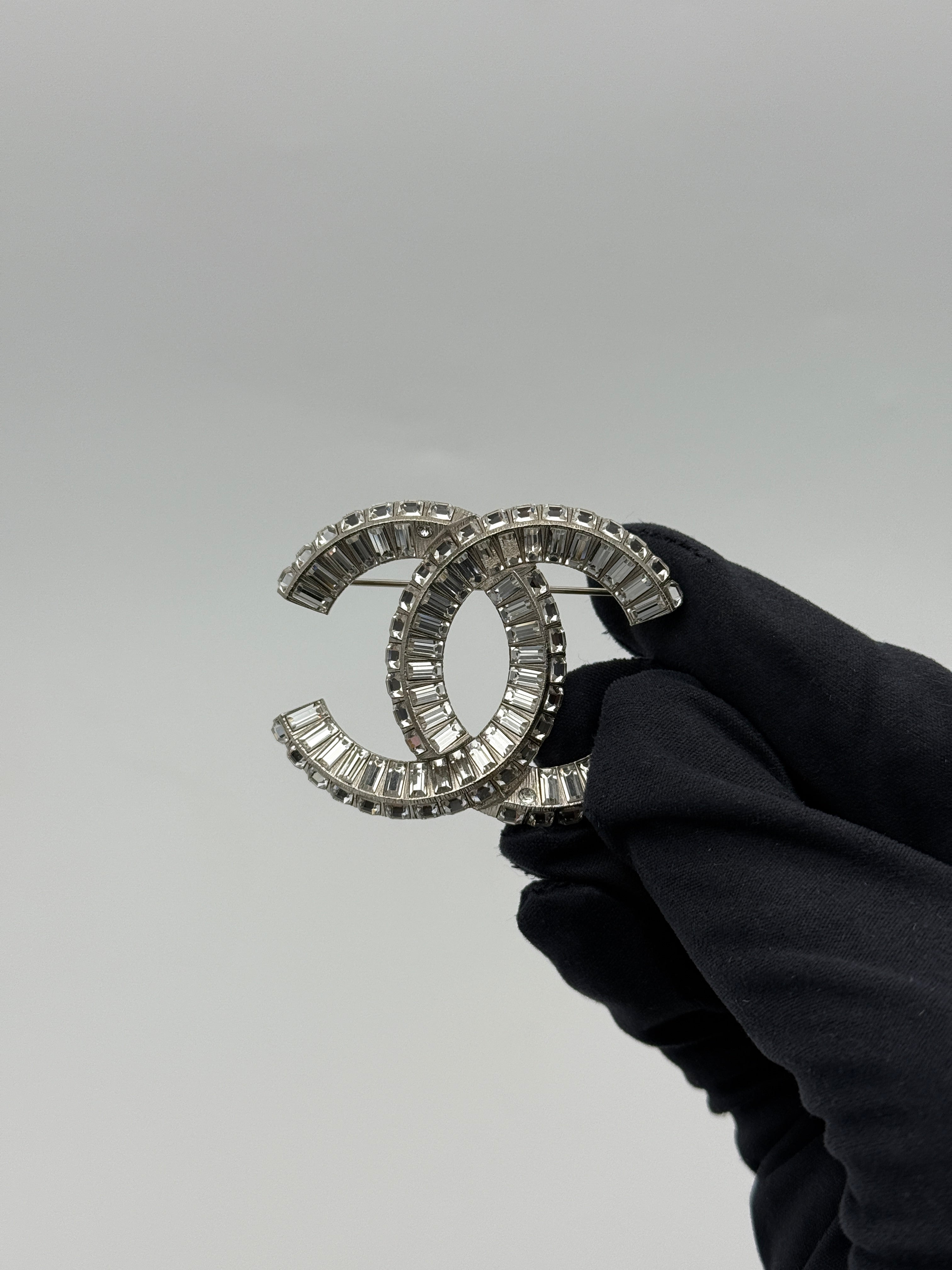 Chanel CC Rhinestone Brooch Silver. Authentic and preloved in excellent condition 