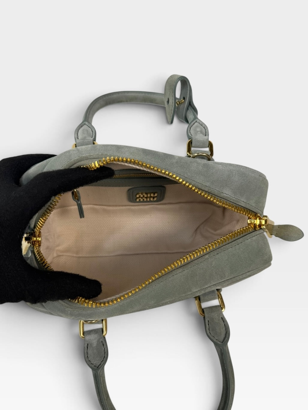 Miu Miu Arcadie Padded Top Handle In Powder Blue Suede Gold Hardware. 100% authentic and preloved in new & unused condition.