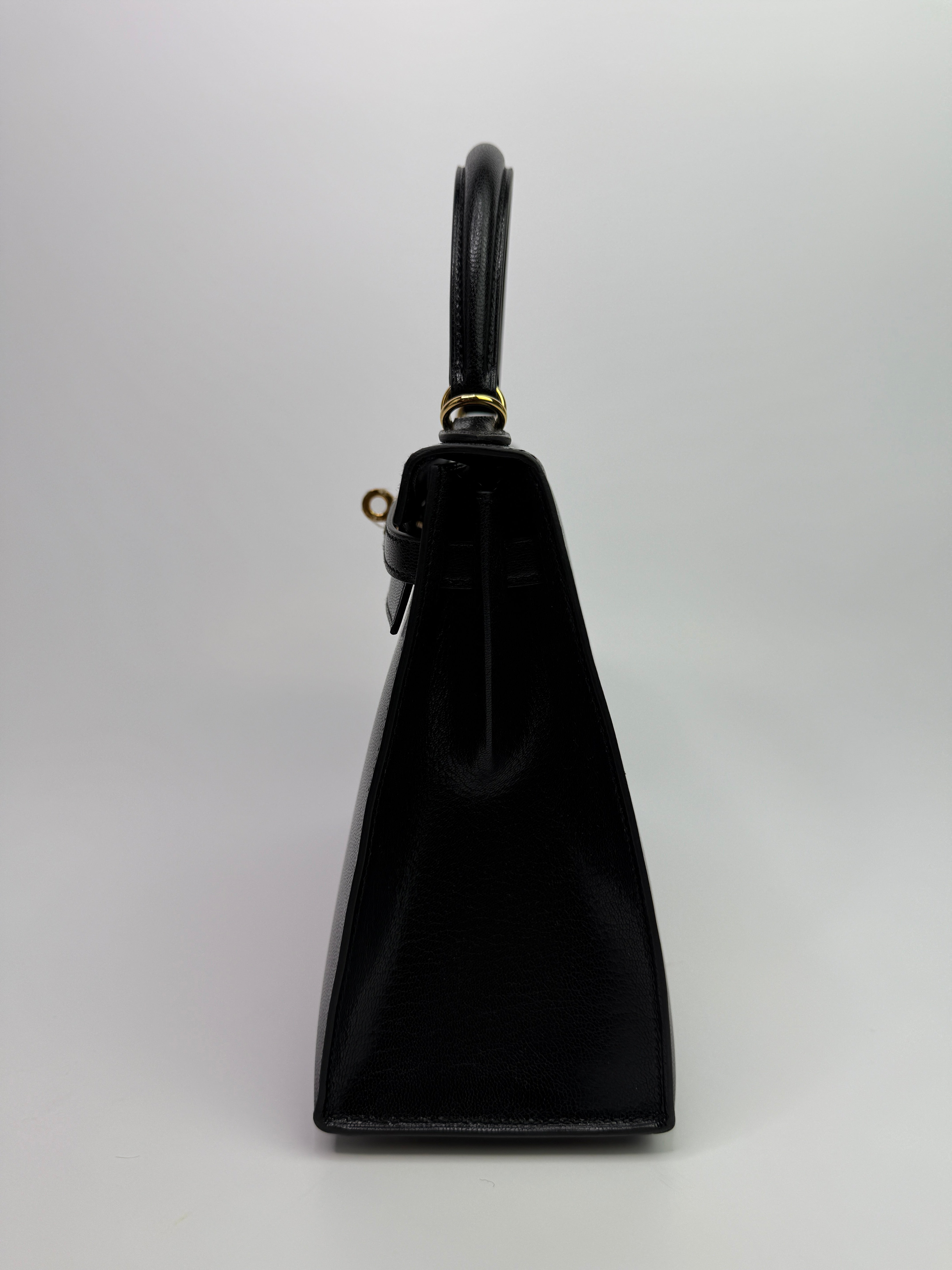 Authentic Pre Loved Hermès Kelly 25 Sellier In Black Chevre Chamilka Leather with Yellow Gold Hardware New & Unused Condition