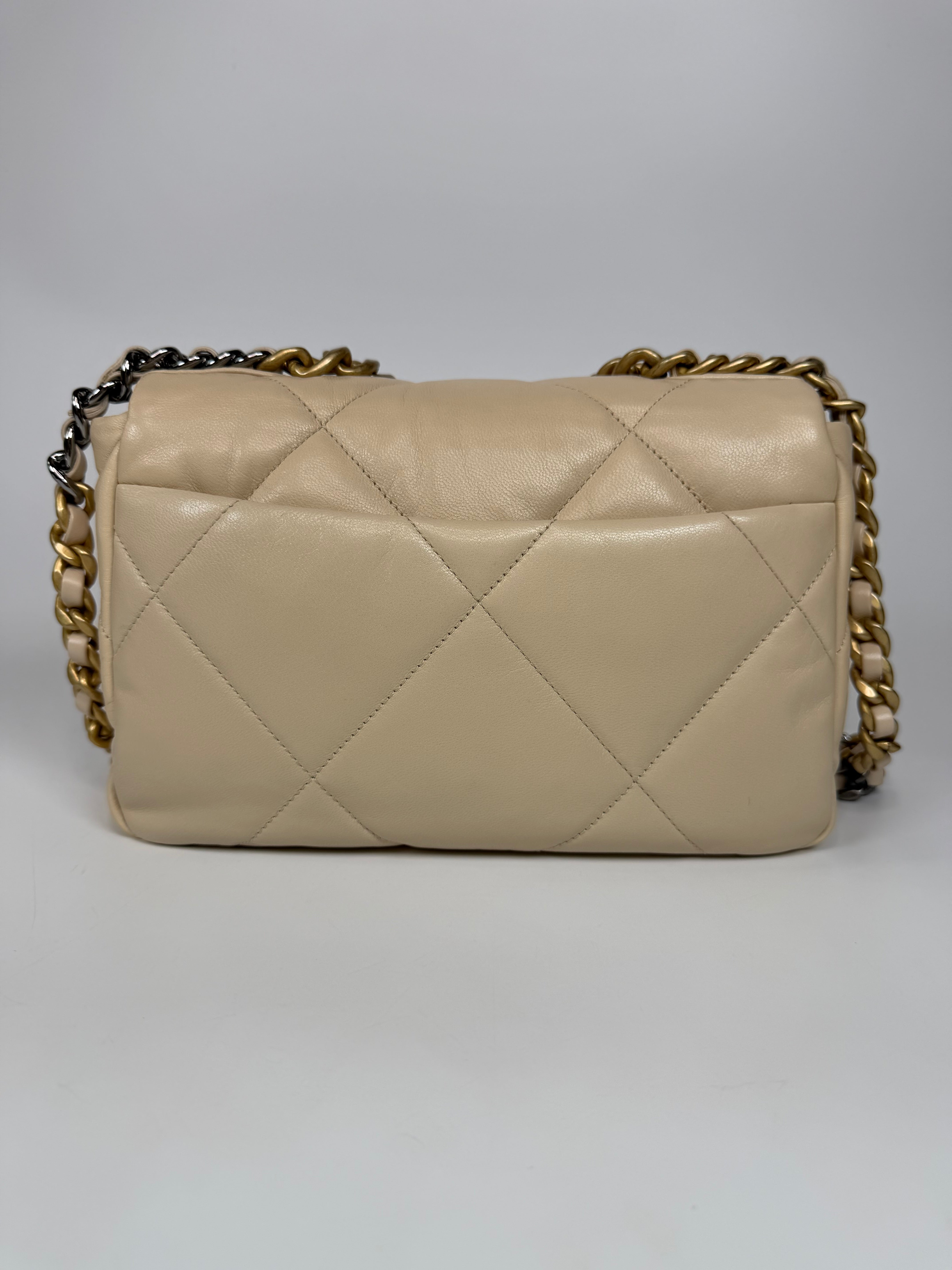 Chanel 19 Small In Beige Leather With Mixed Hardware. Authentic and preloved in excellent condition. Verified by Luxe Cheshire.