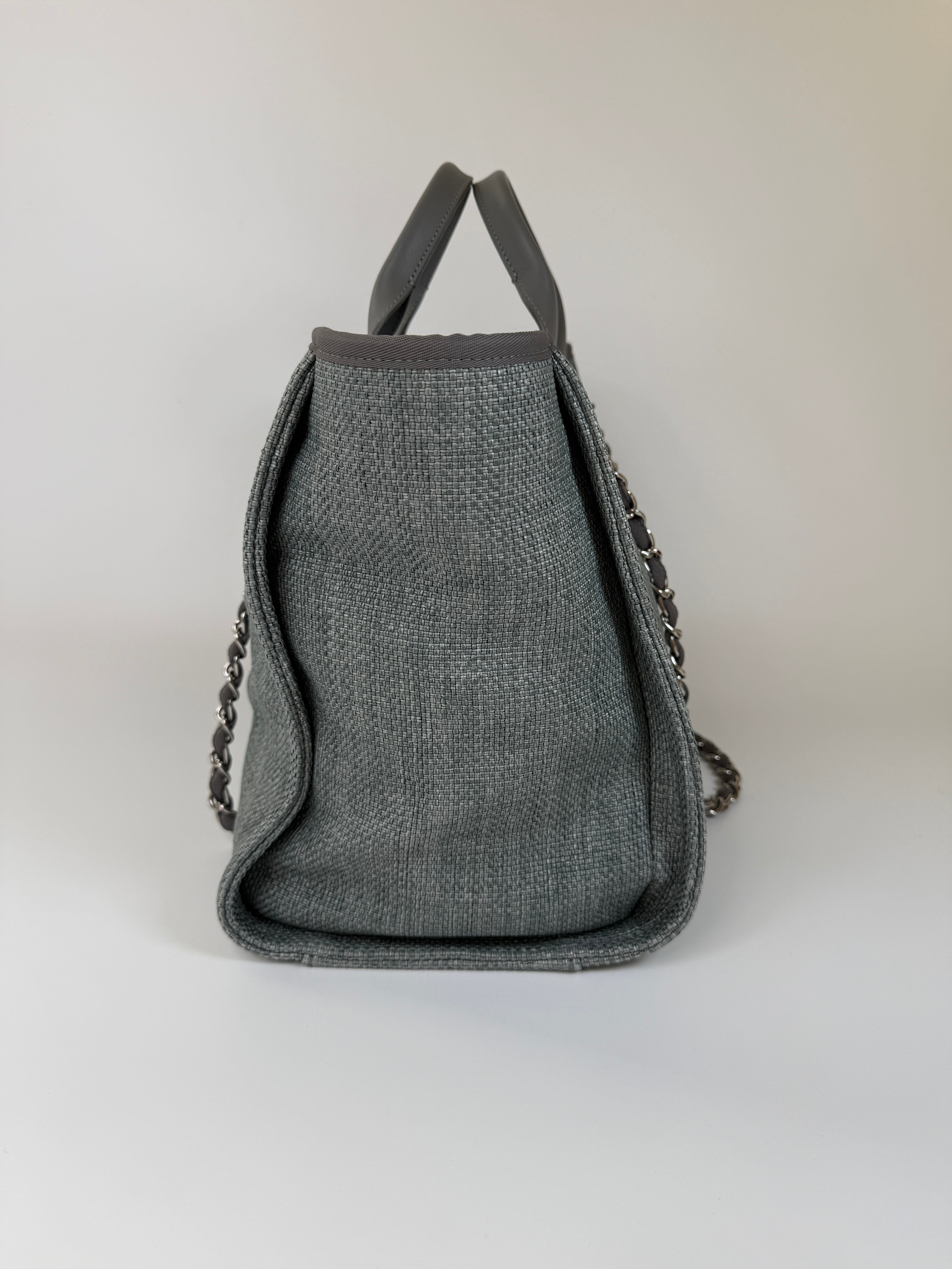 Authentic and preloved Chanel Medium Deauville Tote Bag In Mixed Fibers Rafia Silver Hardware. Excellent condition. 100% Authenticity guarantee 