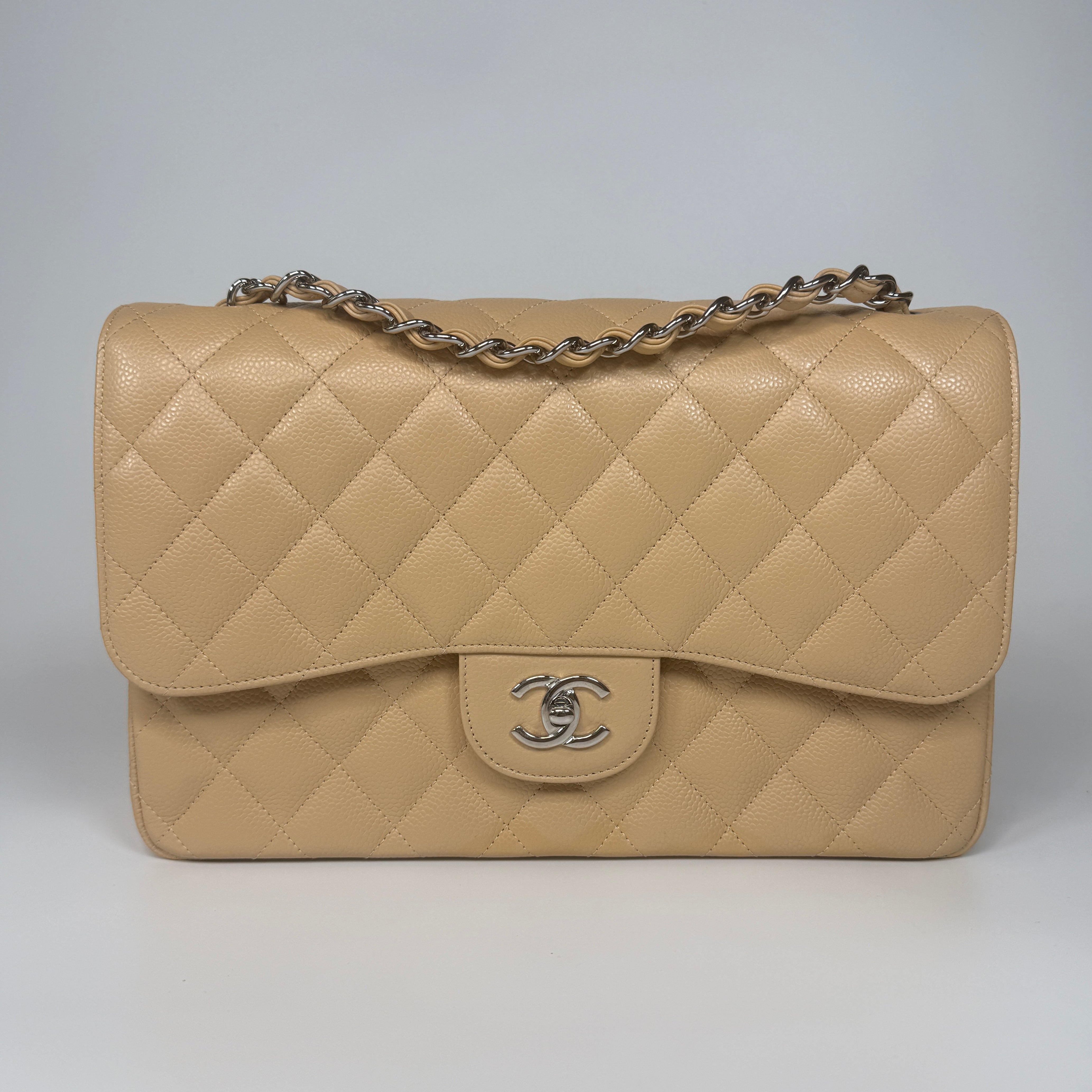 Authentic and preloved Chanel Jumbo Classic Flap Bag In Beige Caviar Leather With Silver Hardware. 100% Authenticity guarantee. Verified by Luxe Cheshire. Fully Insured next day delivery 