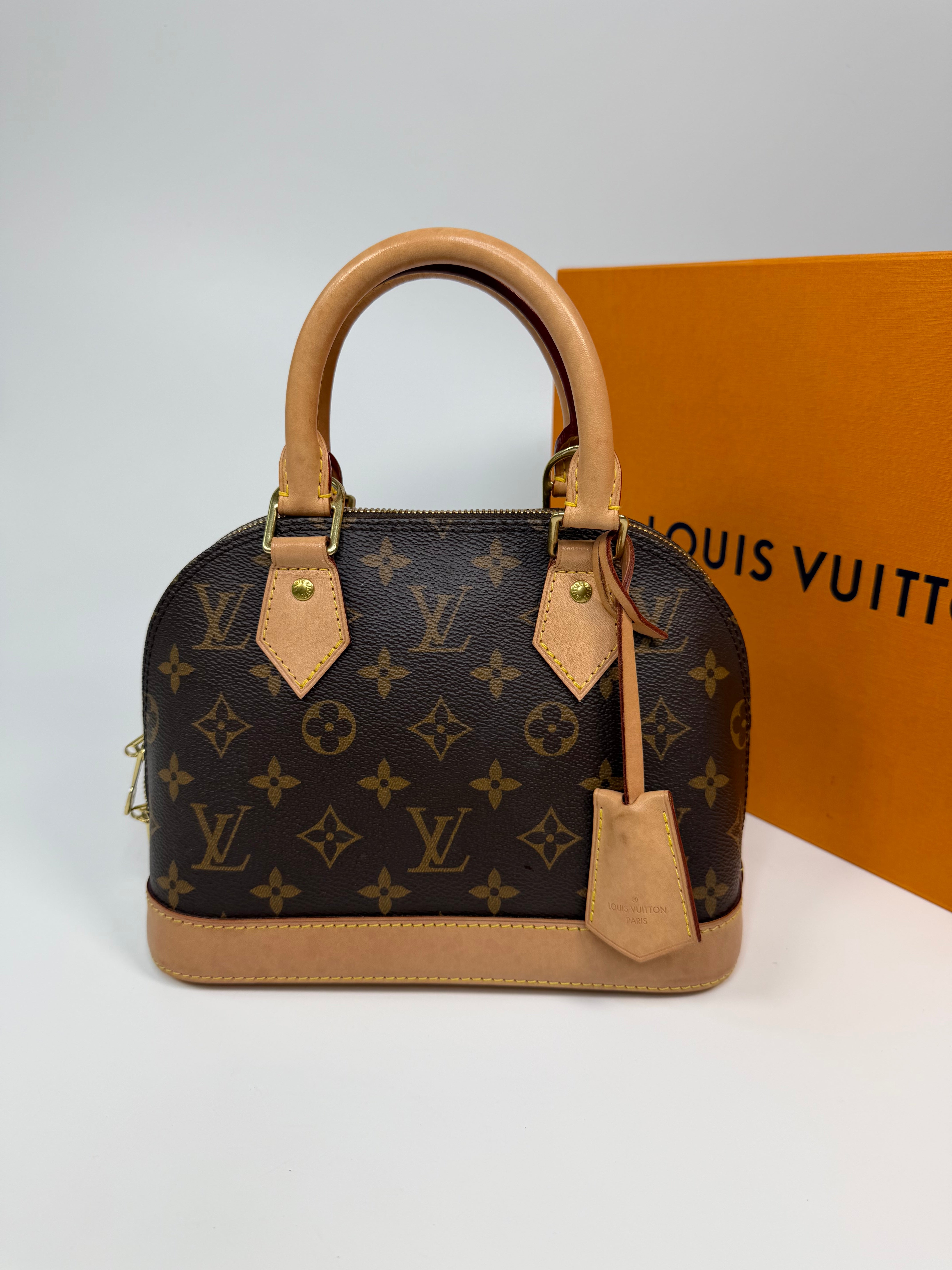 Louis Vuitton Alma BB In Brown Monogram Canvas With Gold Hardware. Authentic and preloved in very good condition