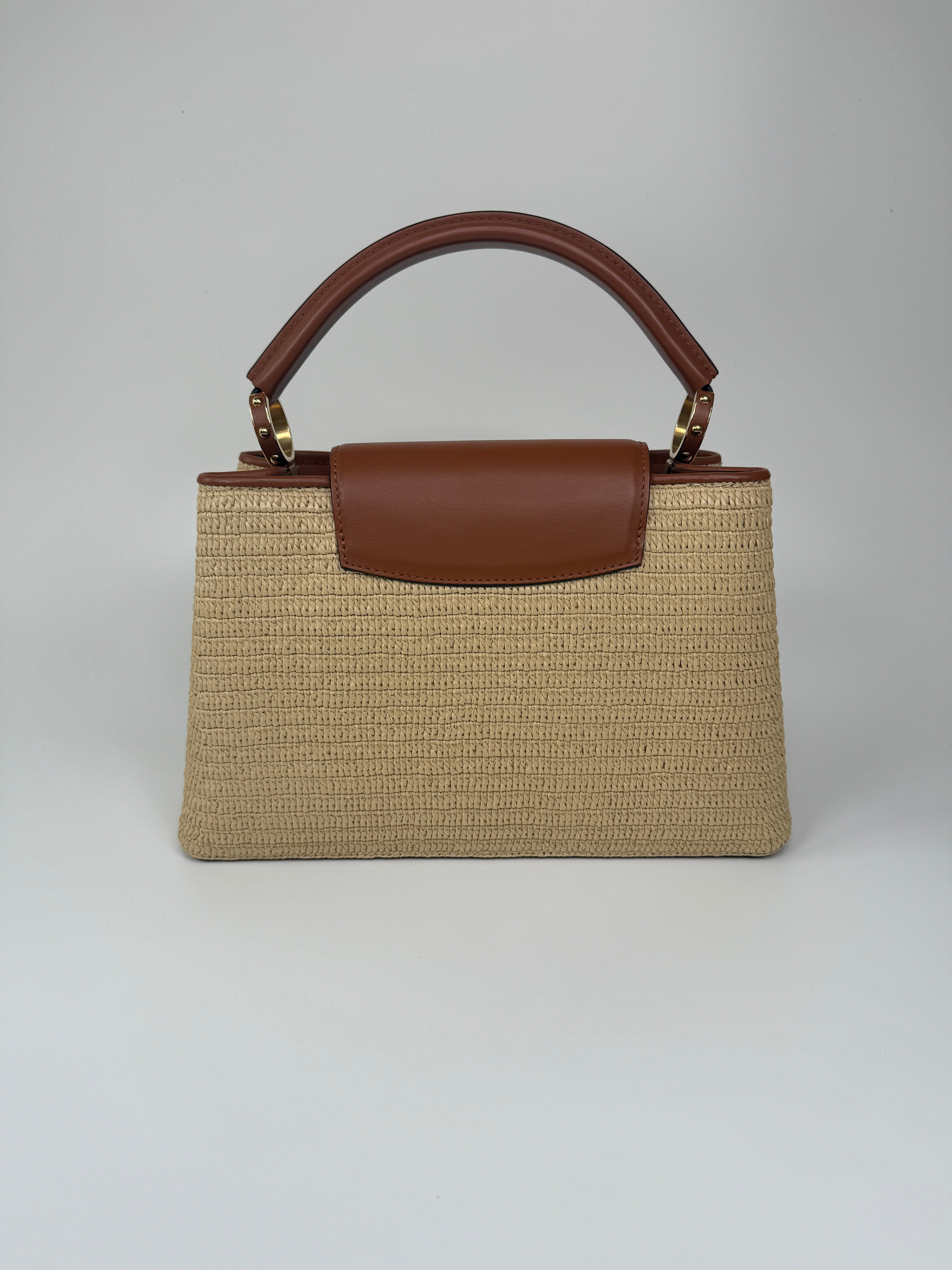 Louis Vuitton Capucines MM Bag In Raffia. Excellent Preloved condition. 100% Authenticity guarantee. 