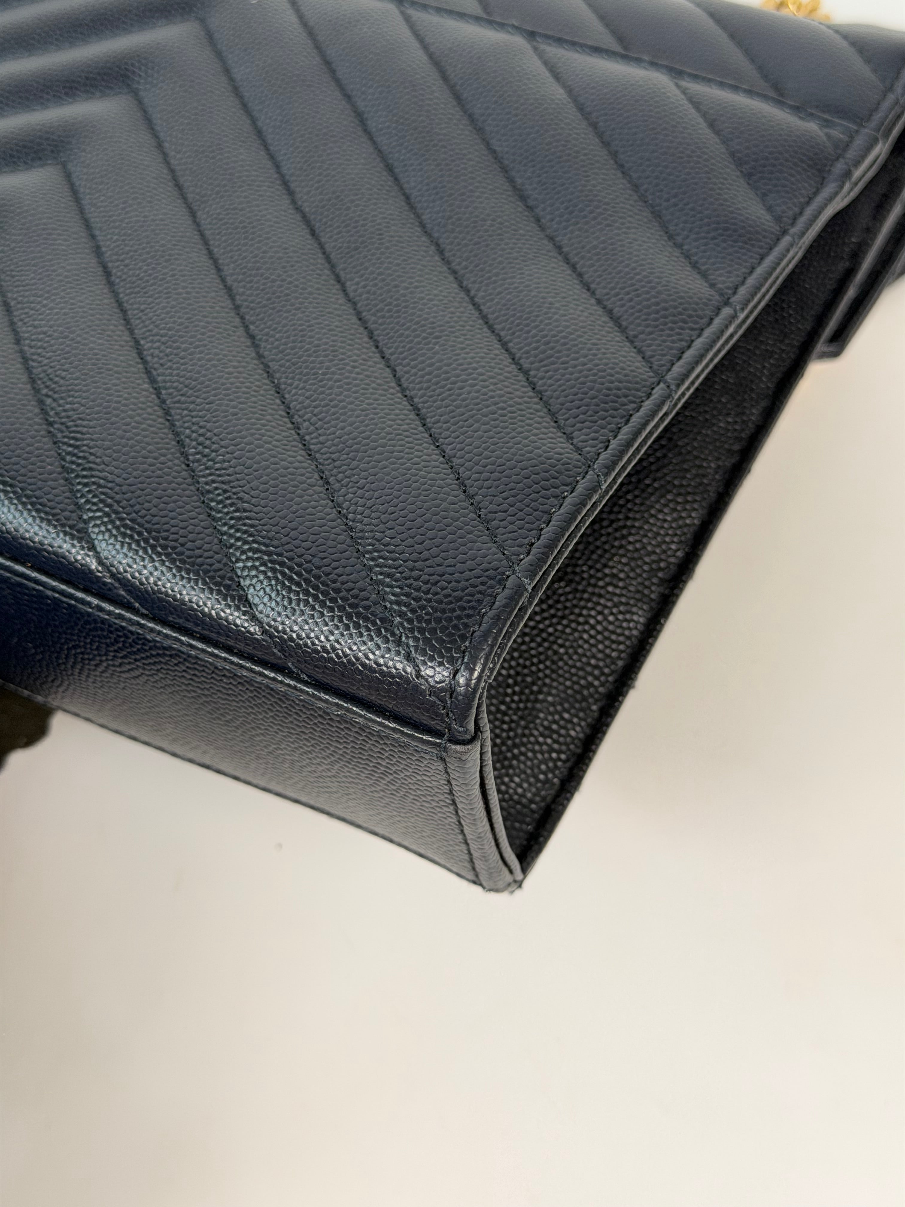 Authentic and pre loved Saint Laurent Medium Envelope Bag In Blue Grained Leather With Gold Hardware. Excellent Condition. Verified by Luxe Cheshire 