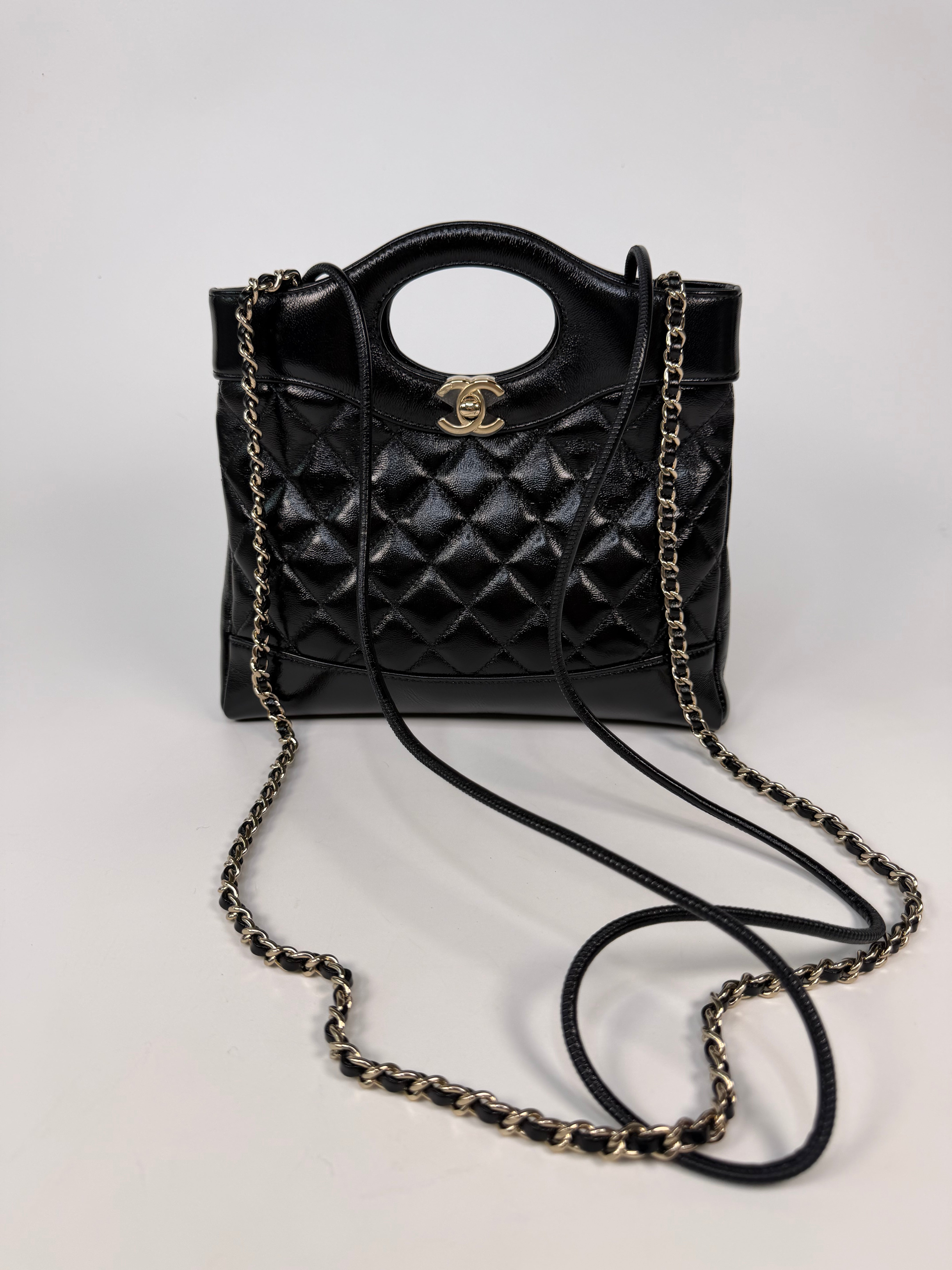 Chanel 31 Small In Black Calfskin Leather With Pale Gold Hardware
Excellent Condition, verified by Luxe Cheshire. Authentic and preloved