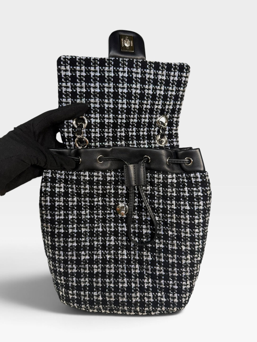 Chanel Backpack In Black & Grey Tweed With Silver Hardware. Authentic and preloved in excellent condition. 100% Guarantee