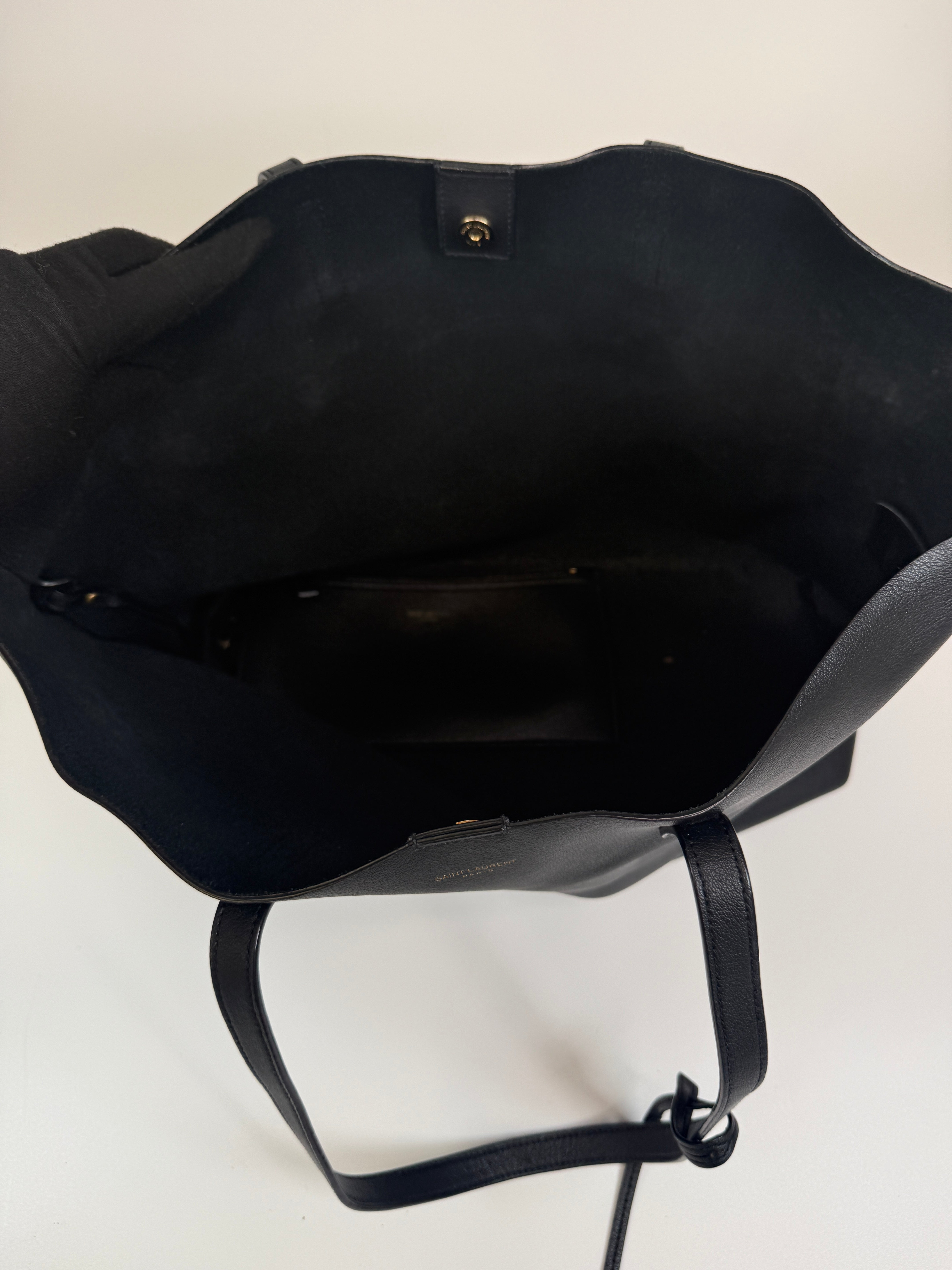 aAuthentic and preloved Saint Laurent Shopping Tote In Black Leather. 100%  Authenticity guarantee 