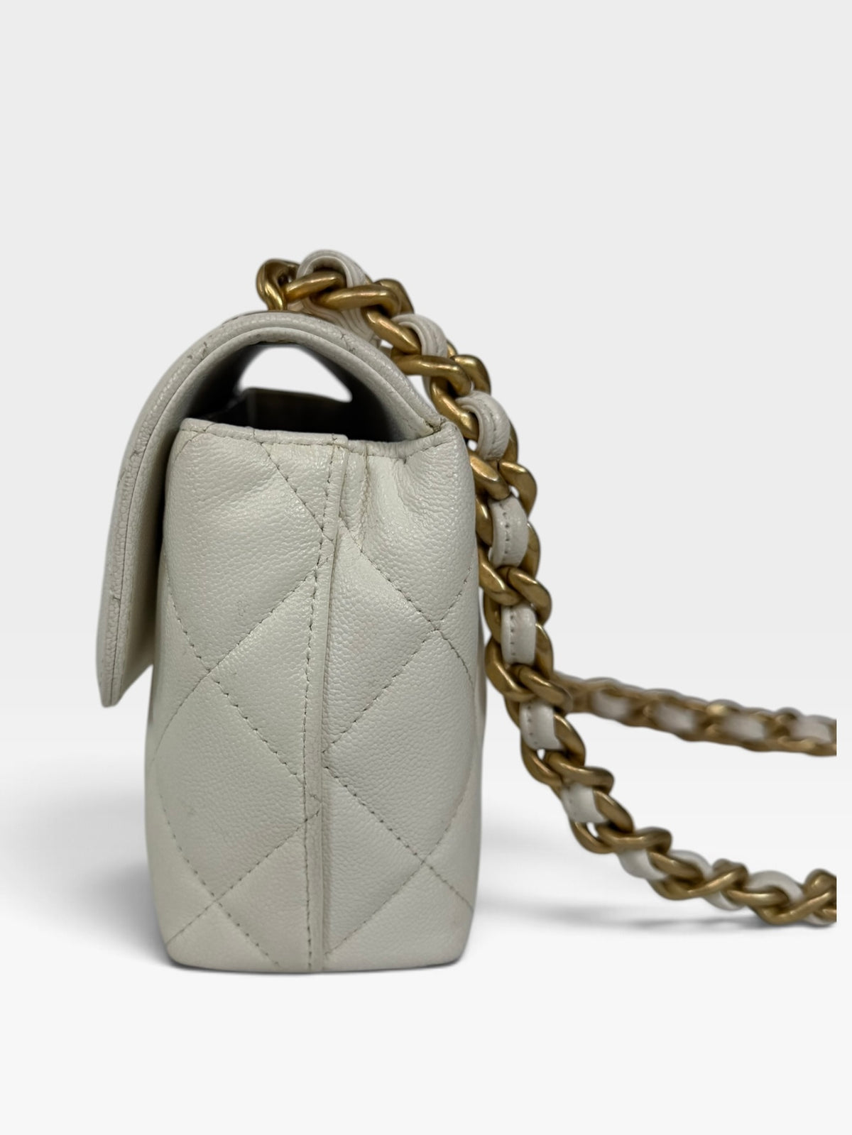 Chanel Mini Flap In White Caviar Leather With Gold Hardware 100% authentic and preloved in excellent condition
