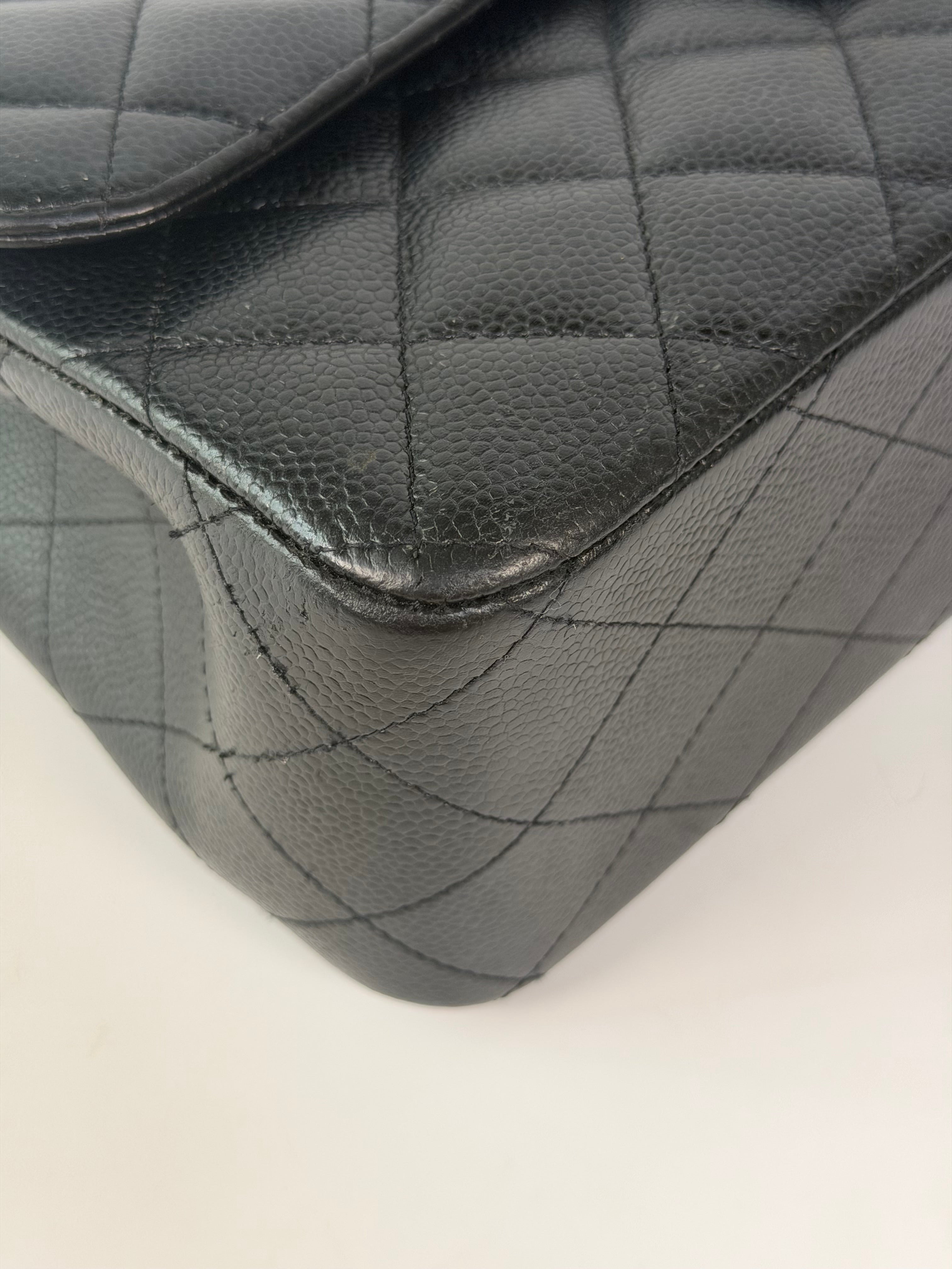 Chanel Jumbo Classic Flap Bag In Black Caviar Leather With Gold Hardware 100% authentic and preloved in excellent condition