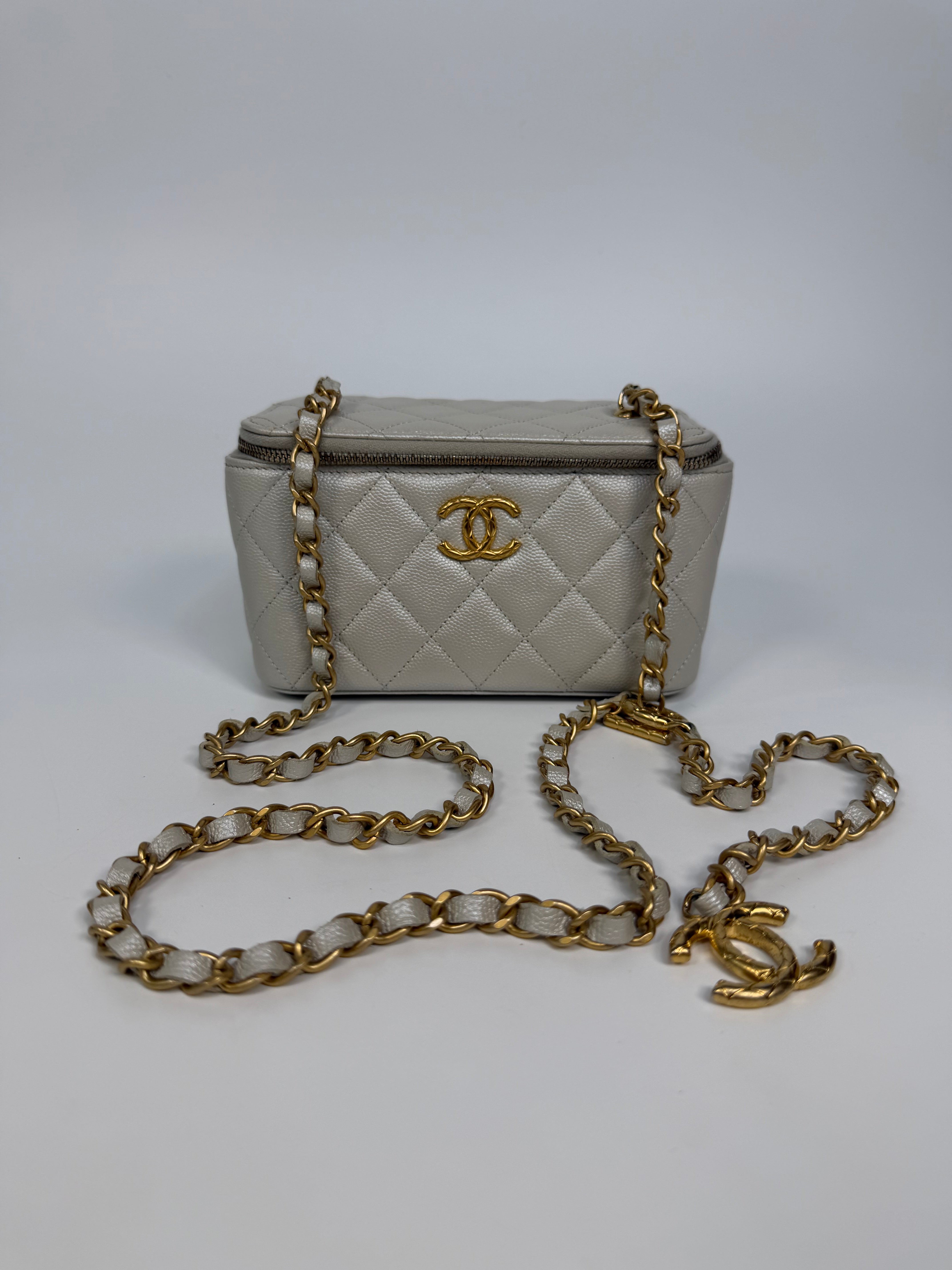 Chanel  Vanity In Light Pearl Grey Caviar Leather With Gold Hardware. Authentic and preloved in excellent condition.