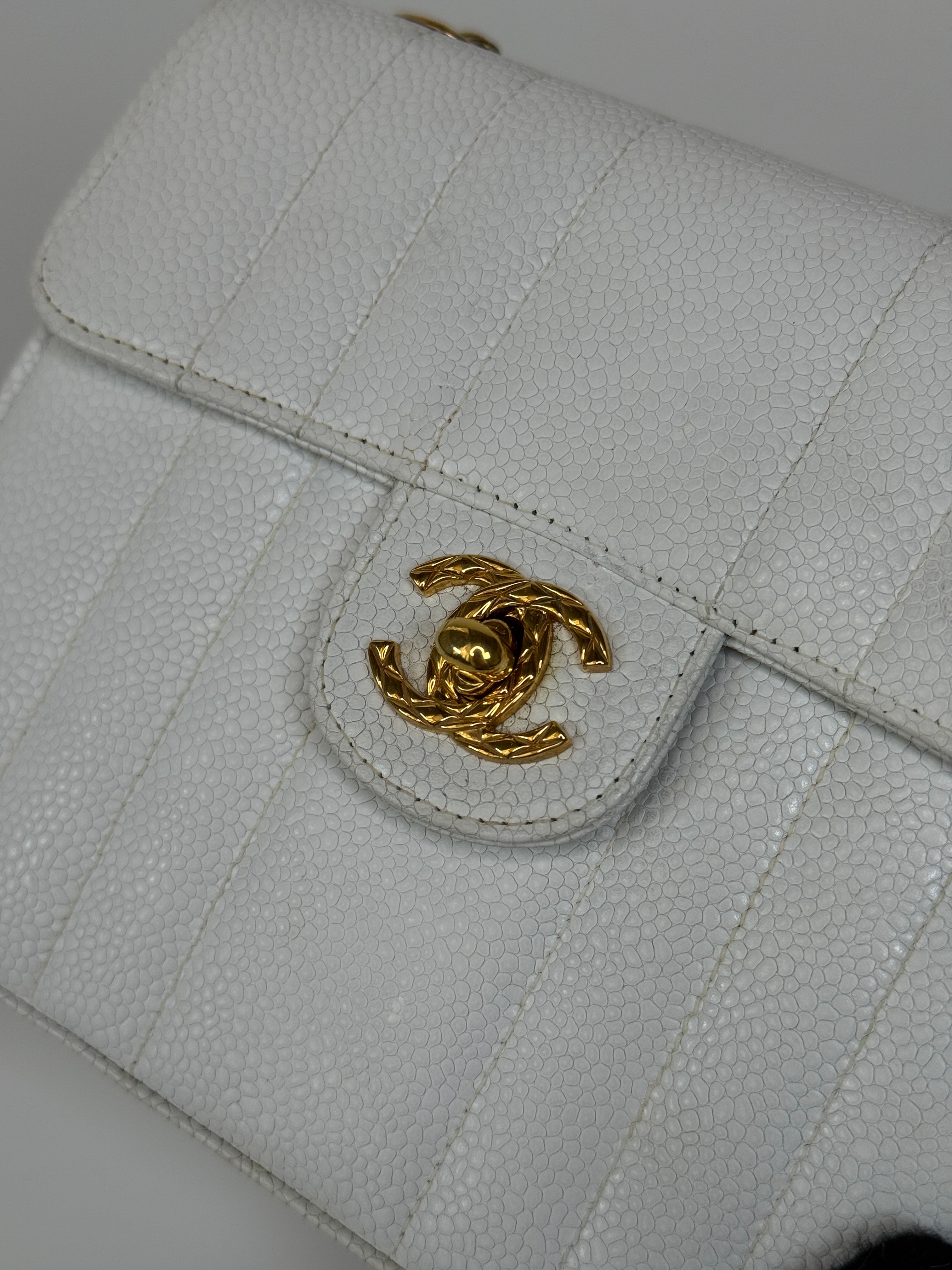 Chanel Vintage Mini Square Flap In White Caviar Leather With 24kt Gold Hardware. Excellent condition 100% Authenticity Guarantee 