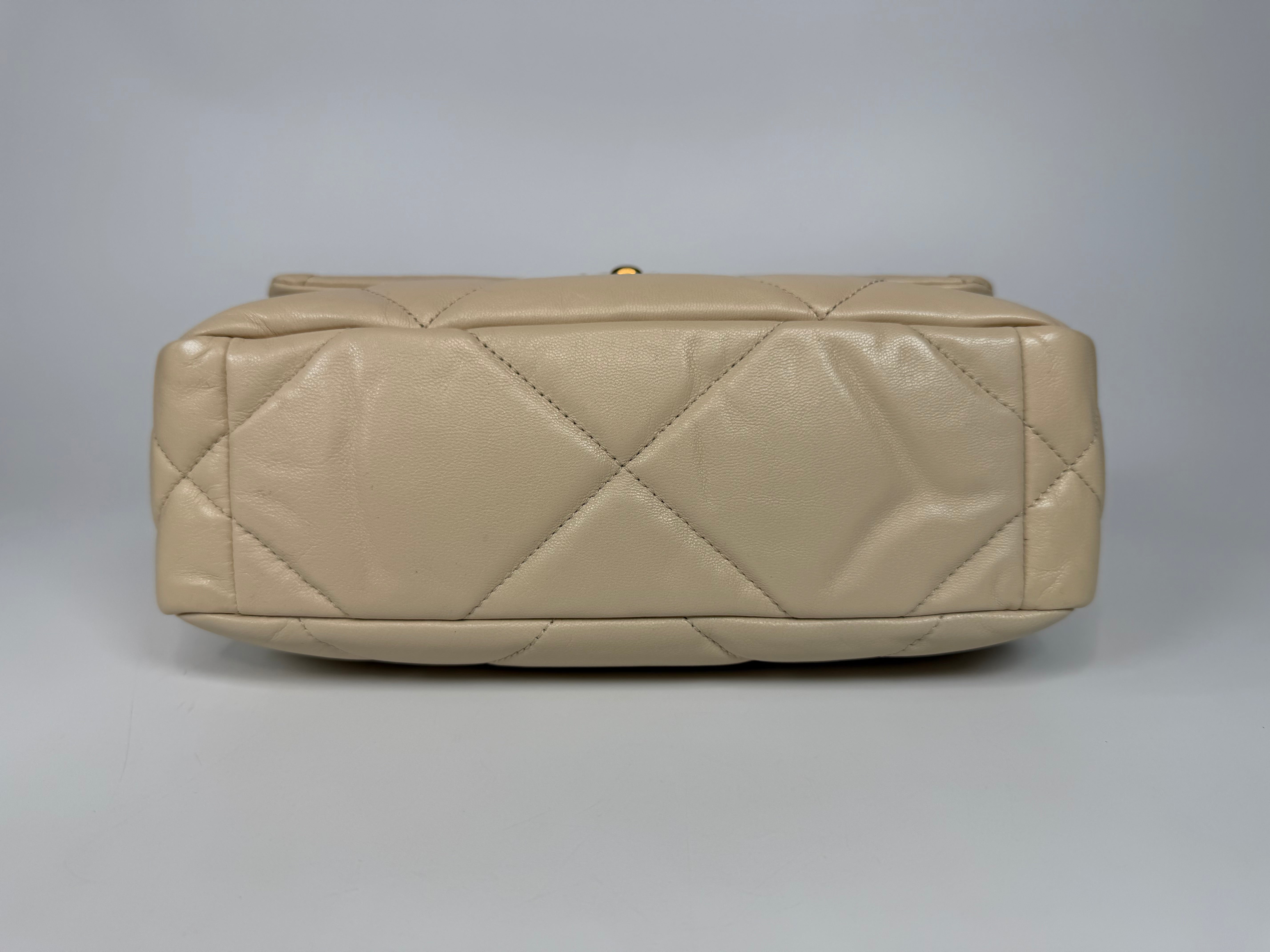 Chanel 19 Small In Beige Leather With Mixed Hardware. Authentic and preloved in excellent condition. Verified by Luxe Cheshire.