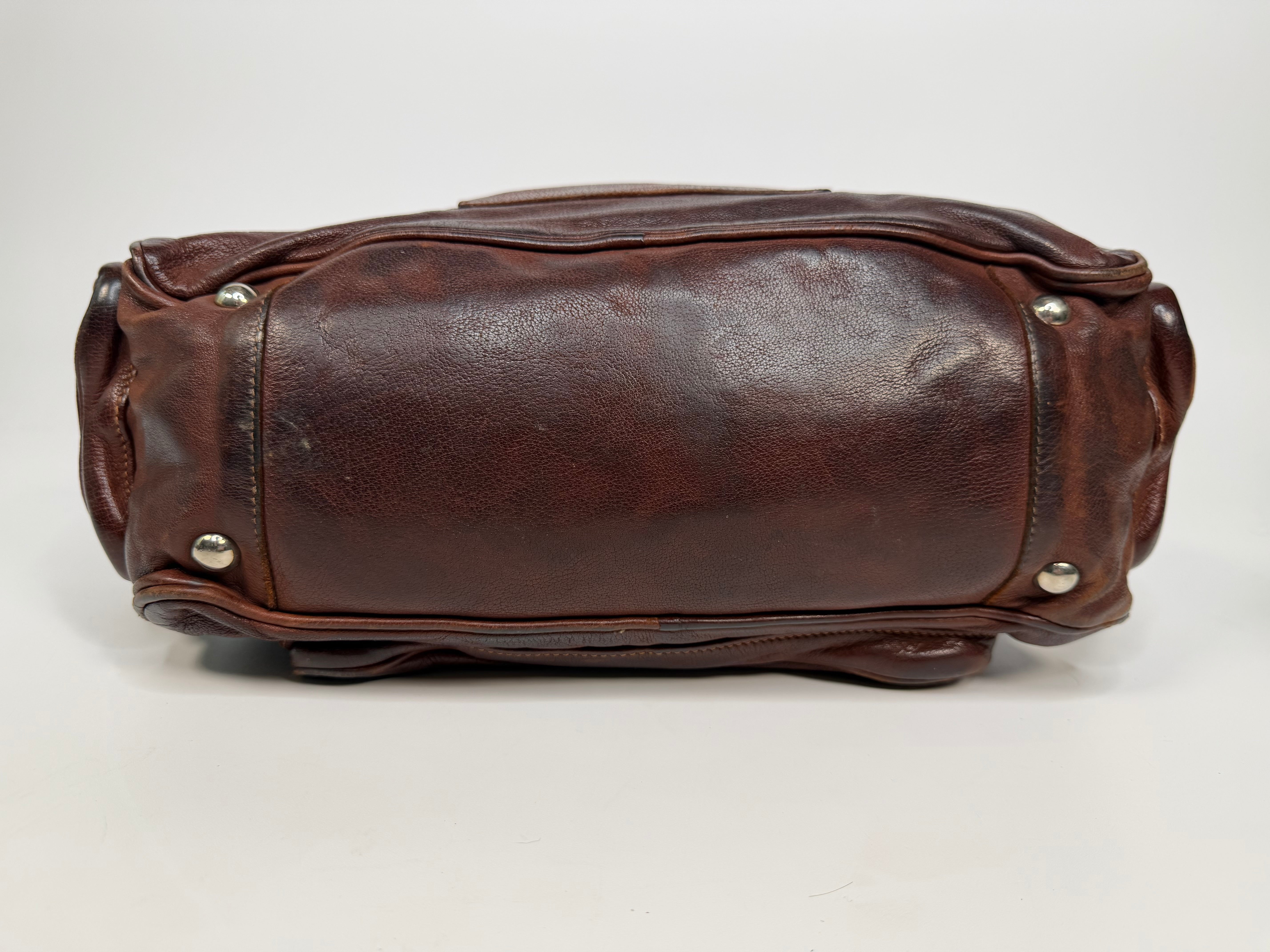 Prada Washed Bauletto Shoulder Bag In Brown Leather With Gold Hardware. Authentic and preloved in very good condition