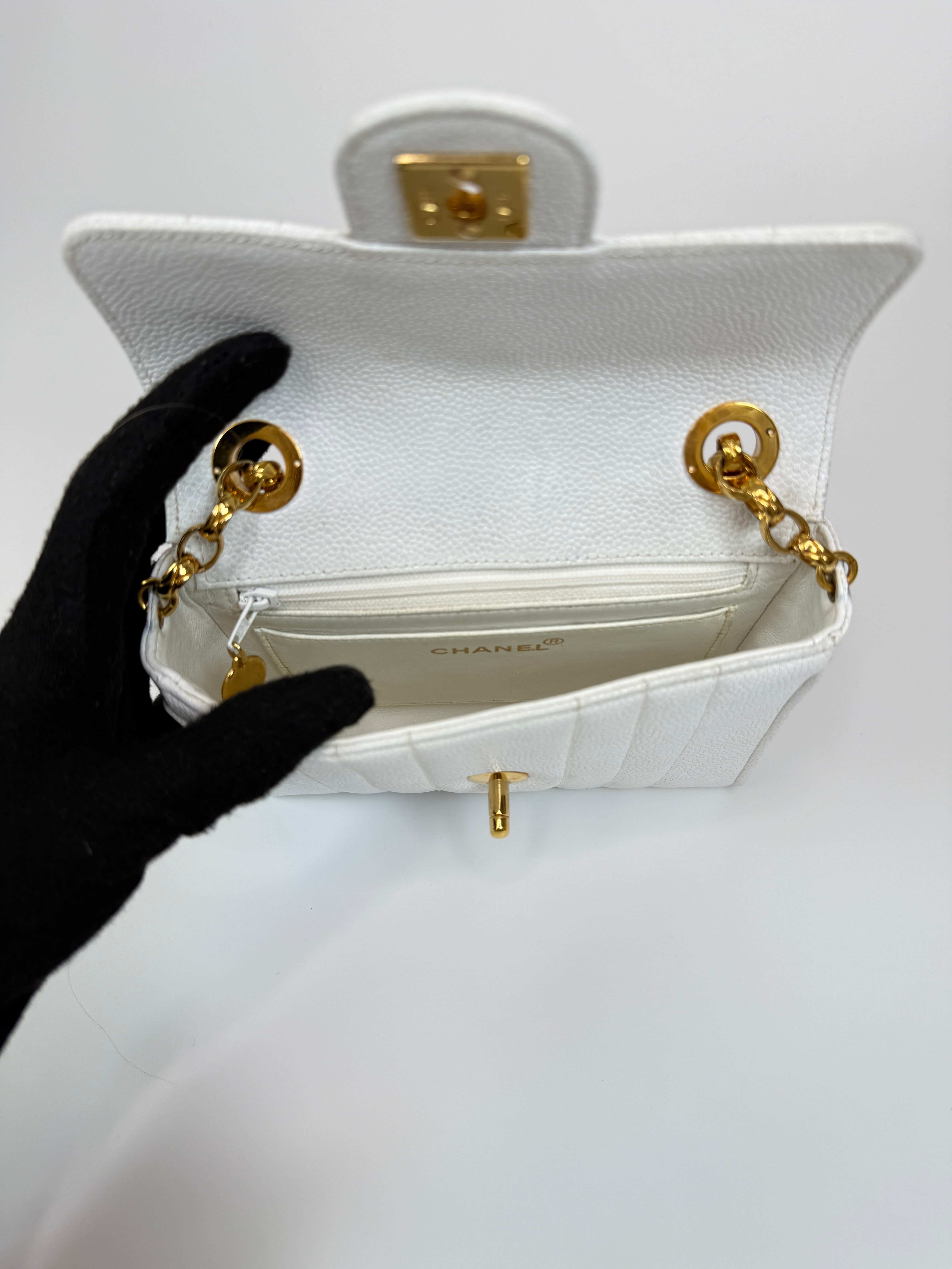 Chanel Vintage Mini Square Flap In White Caviar Leather With 24kt Gold Hardware. Excellent condition 100% Authenticity Guarantee 
