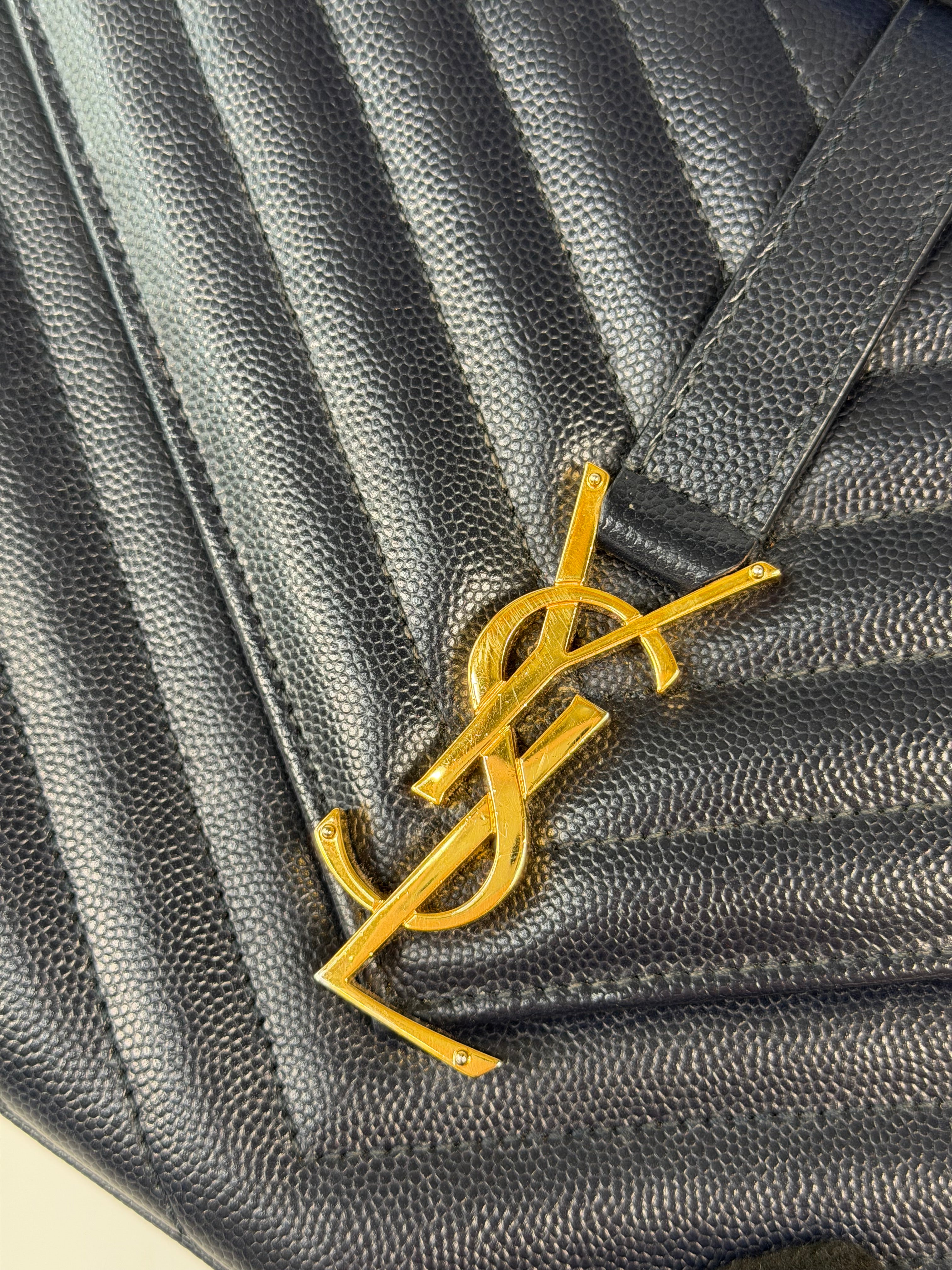 Authentic and pre loved Saint Laurent Medium Envelope Bag In Blue Grained Leather With Gold Hardware. Excellent Condition. Verified by Luxe Cheshire 