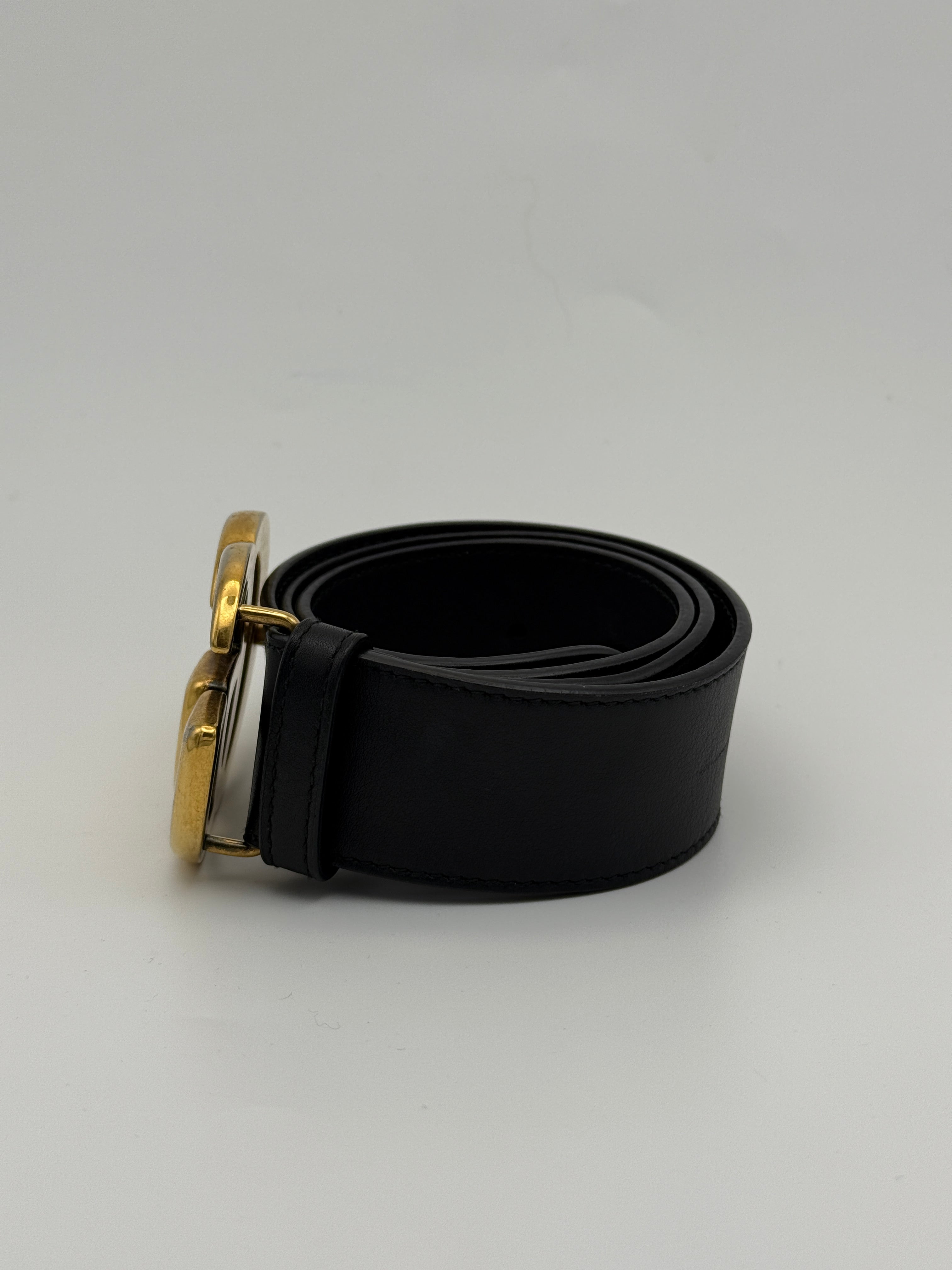 Gucci GG Marmont Wide Belt In Black Leather With Gold GG Buckle. Authentic and preloved in Excellent condition. Insured next day delivery. Verified by Luxe Cheshire. 