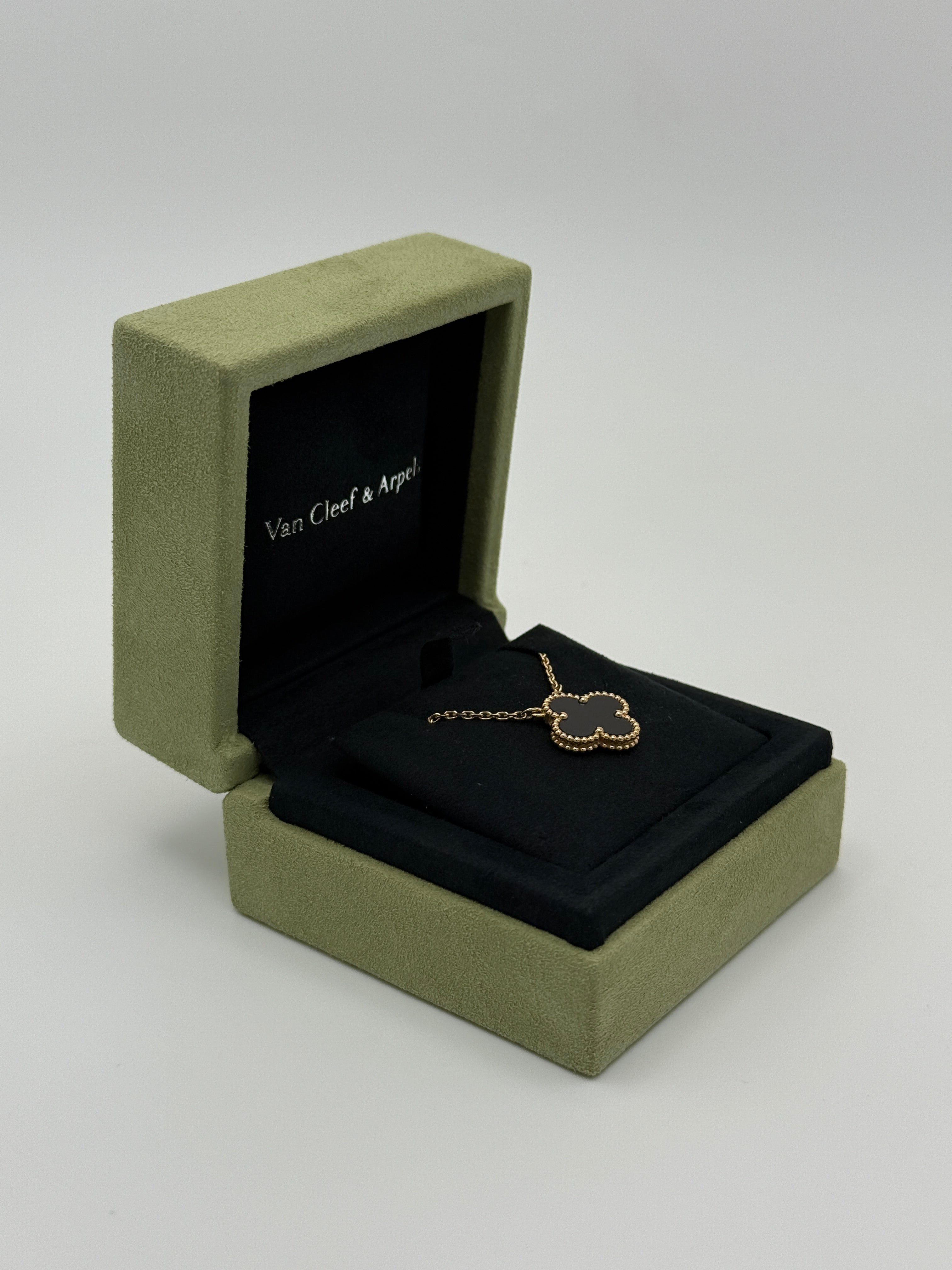 Van Cleef & Arpels Vintage Alhambra Gold And Onyx Pendant