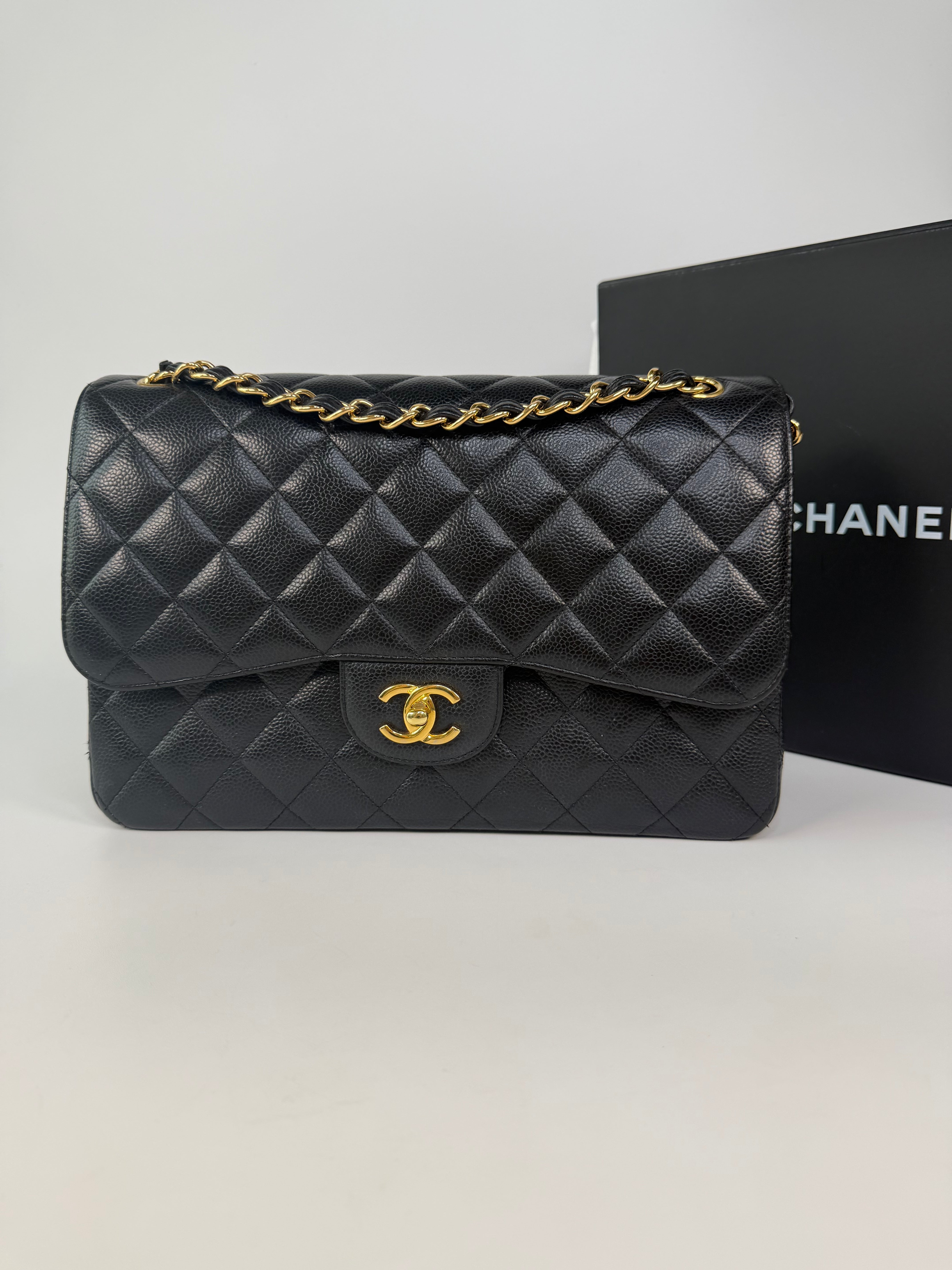 Chanel Jumbo Classic Flap Bag In Black Caviar Leather With Gold Hardware 100% authentic and preloved in excellent condition