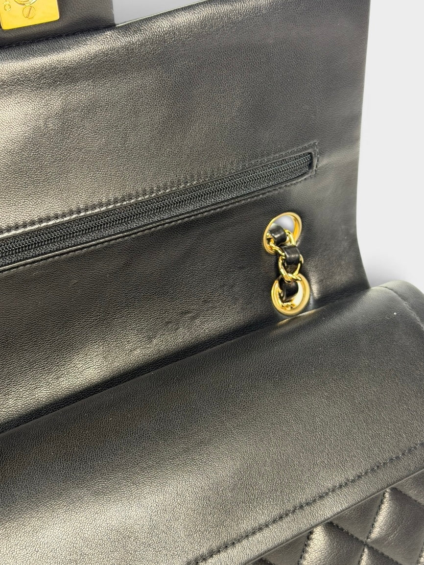 Chanel Medium Classic Double Flap In Black Lambskin Leather With Gold Hardware. 100% authentic and preloved in excellent condition