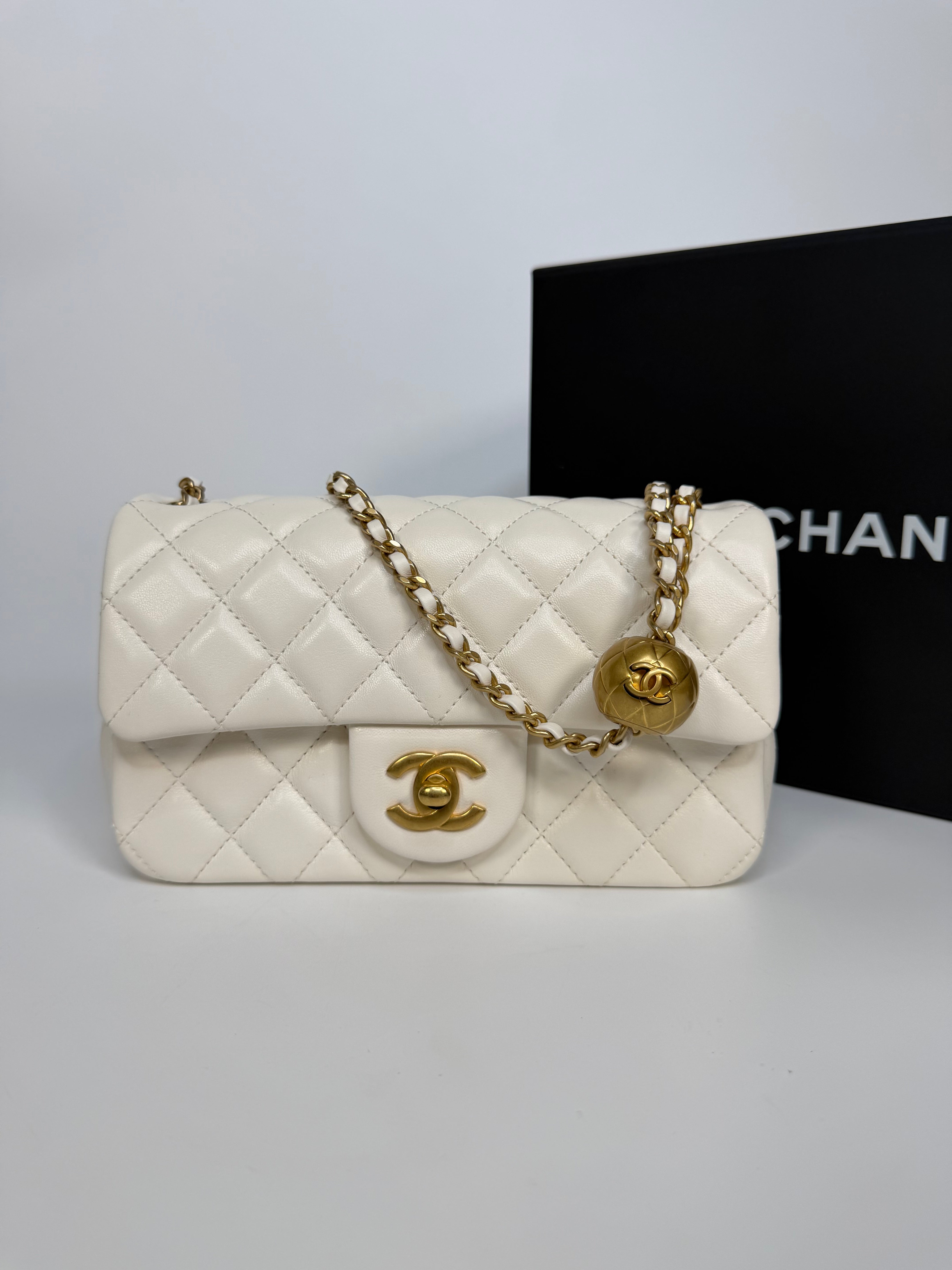 Chanel Pearl Crush Mini Rectangle In White Lambskin Leather Gold Hardware. Authentic and preloved in excellent condition with 100% authenticity guarantee.
