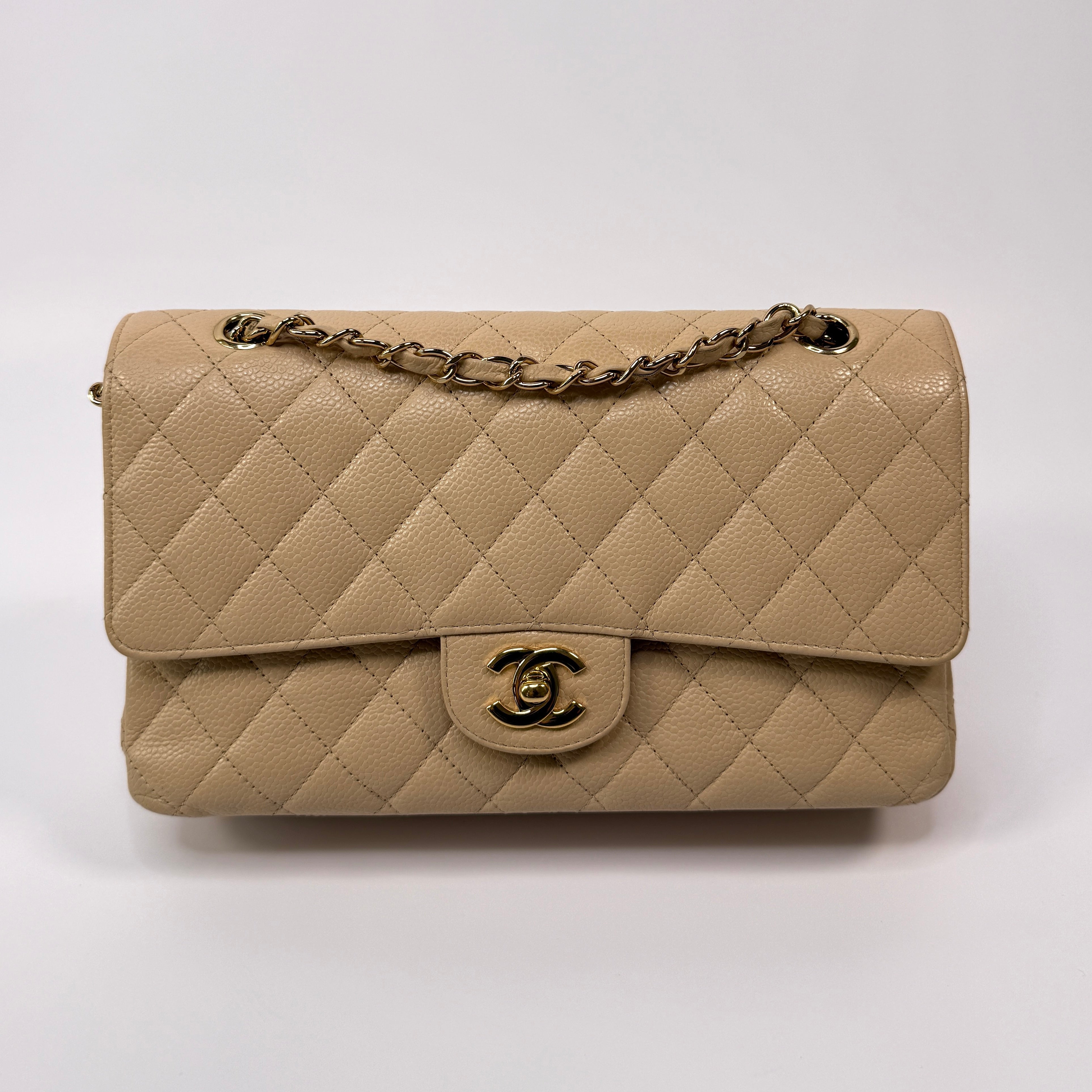 Chanel Medium Classic Double Flap Beige Caviar Leather With Gold Hardware
Pre Loved & Authentic 