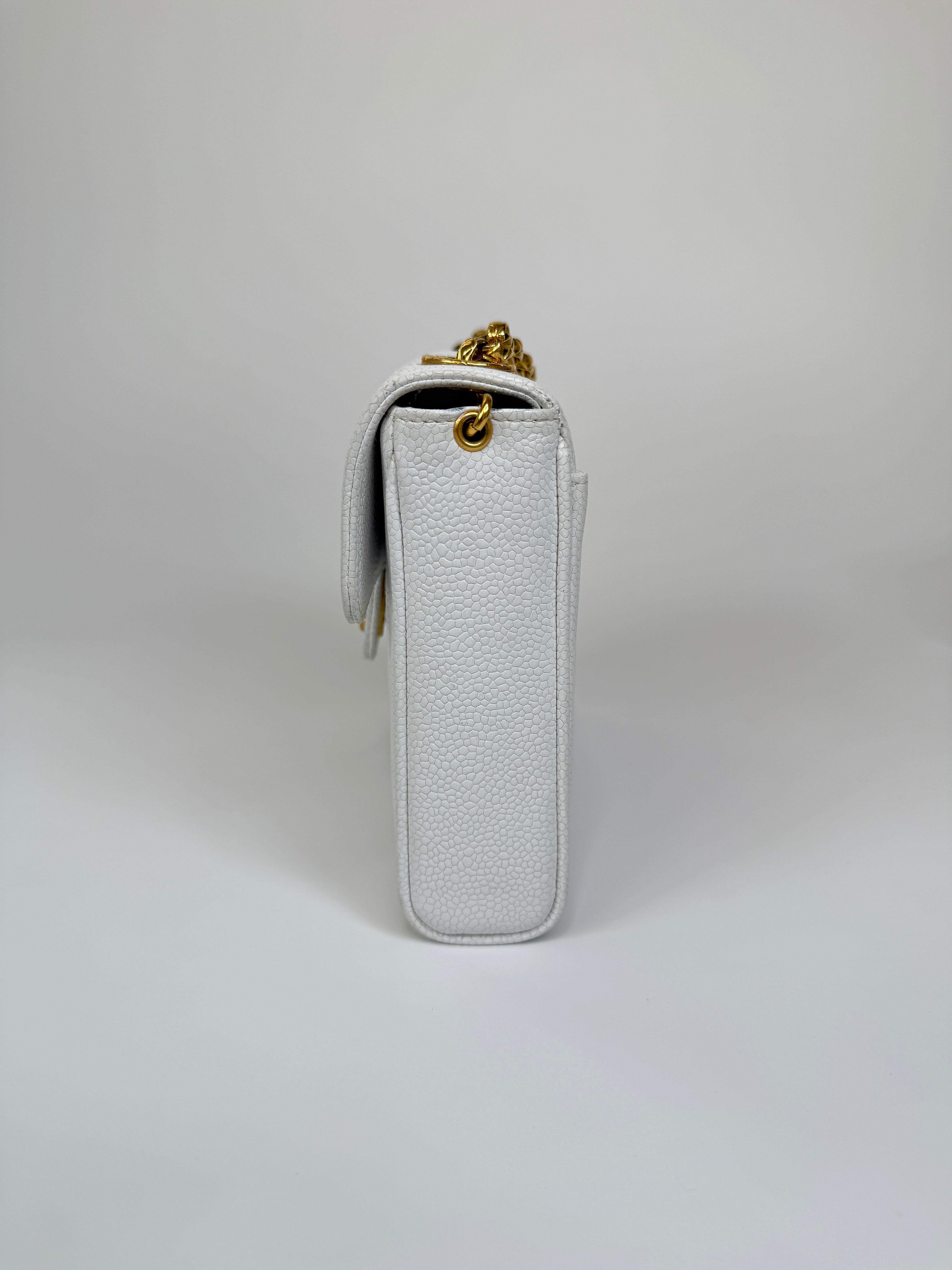 Chanel Vintage Mini Square Flap In White Caviar Leather With 24kt Gold Hardware. Excellent condition 100% Authenticity Guarantee 