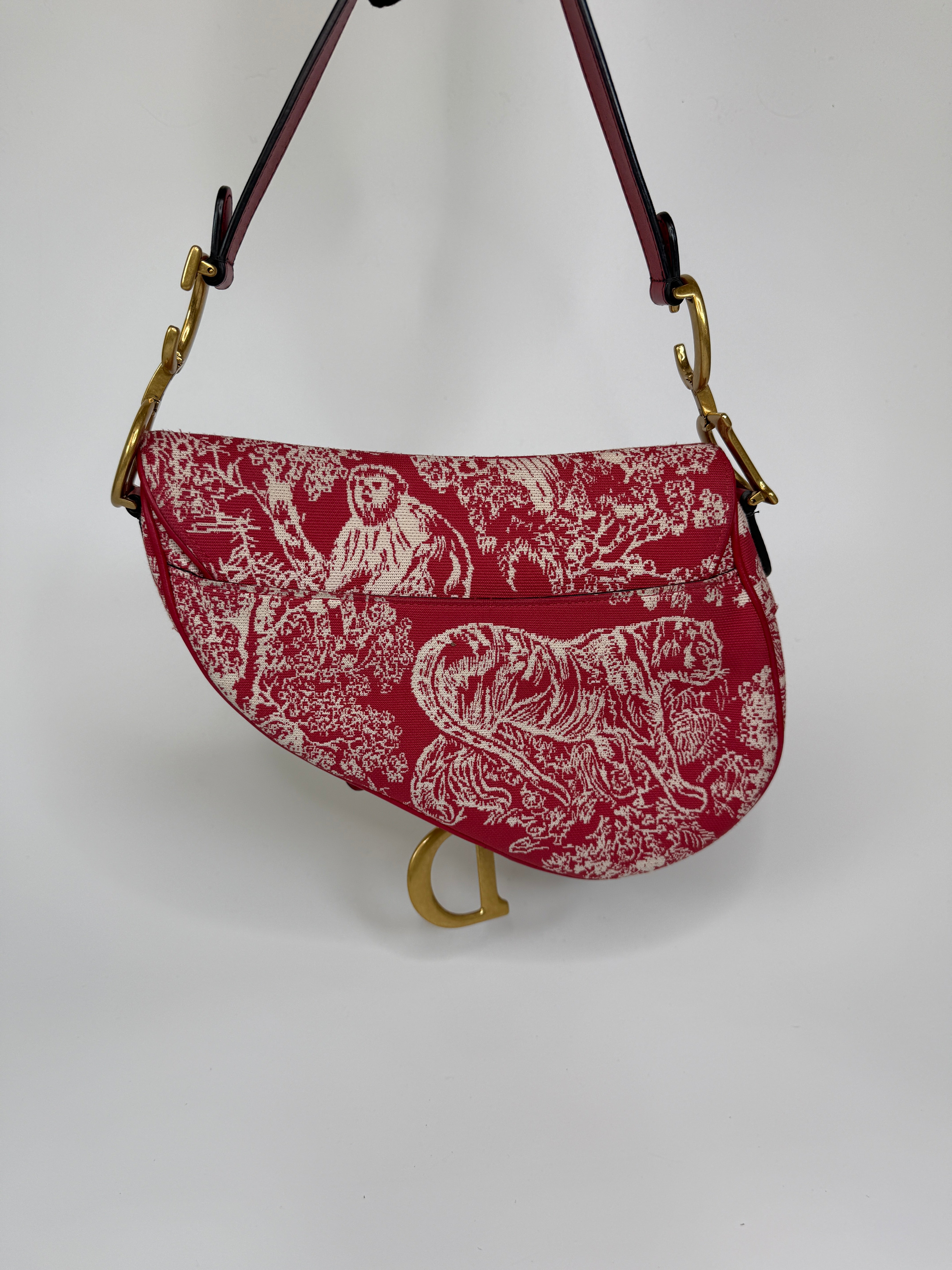 Christian Dior Saddle Bag In Rain Forest Red. Authentic and preloved In excellent condition. 100% Authenticity guarantee 