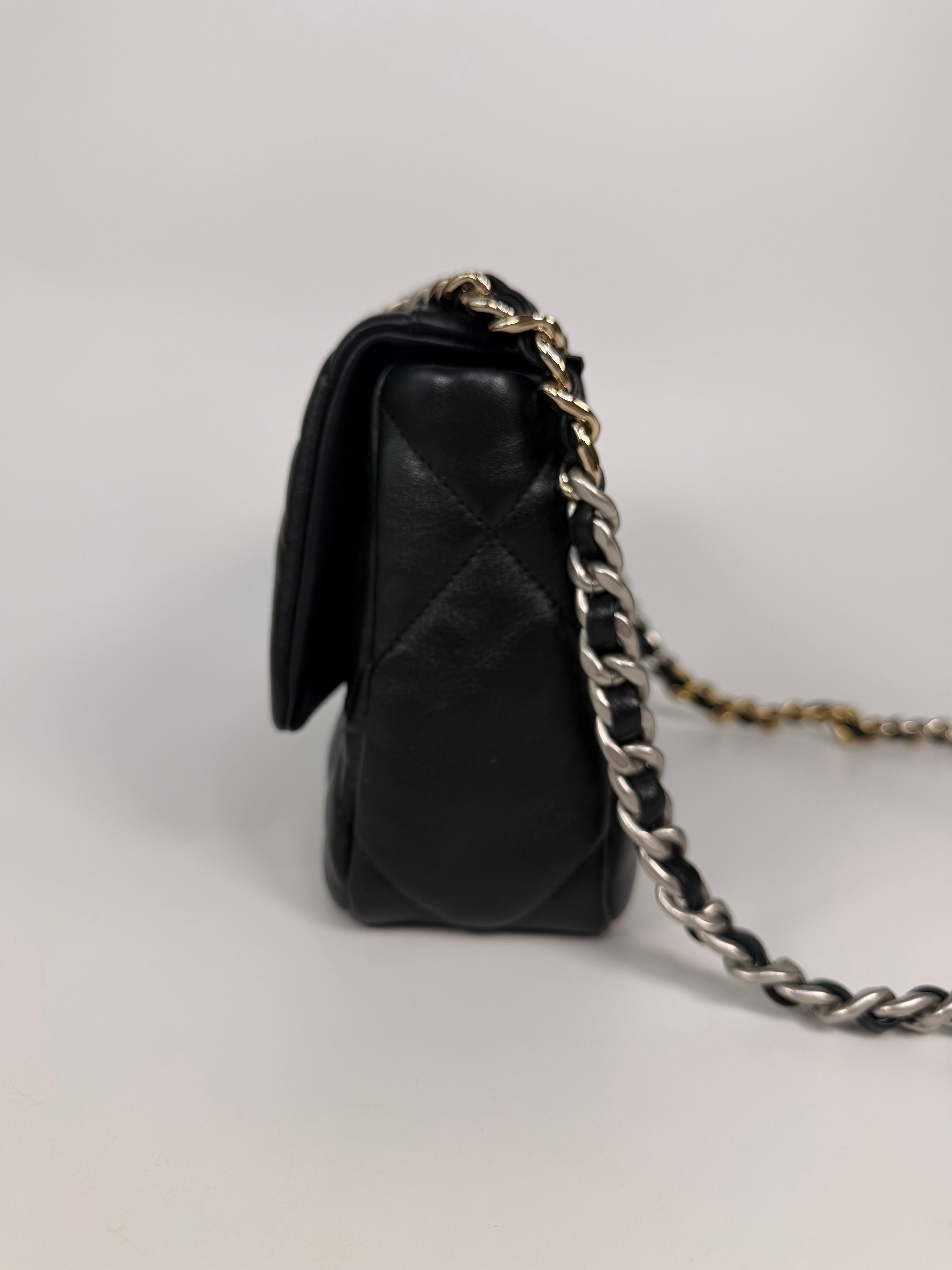 Chanel 19 Small In Black & White Leather With Mixed Hardware. Authentic and preloved in excellent condition. Verified by Luxe Cheshire.