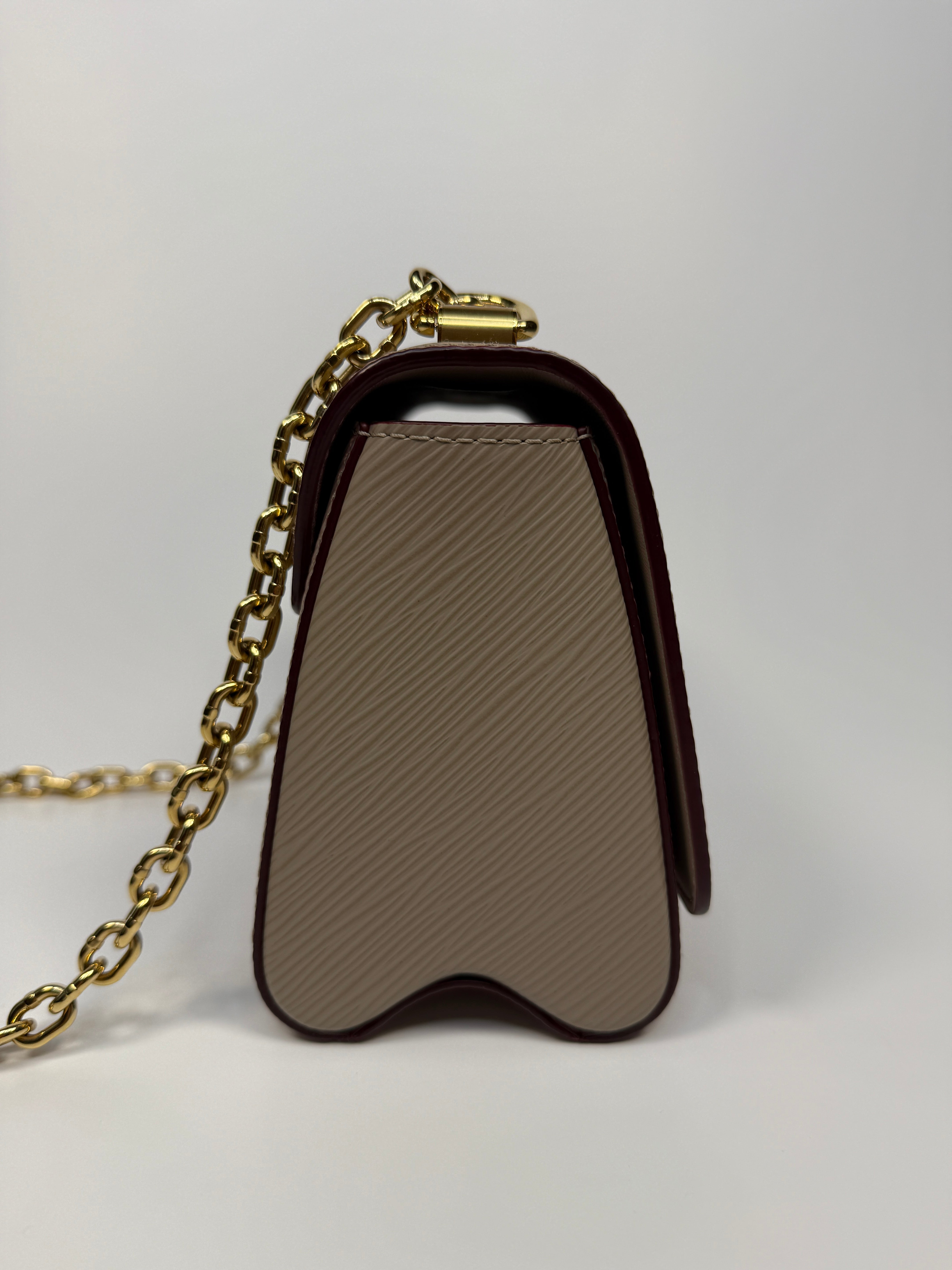 Louis Vuitton Twist PM Shoulder Bag In Beige leather with gold hardware. Authentic and pre loved excellent condition 