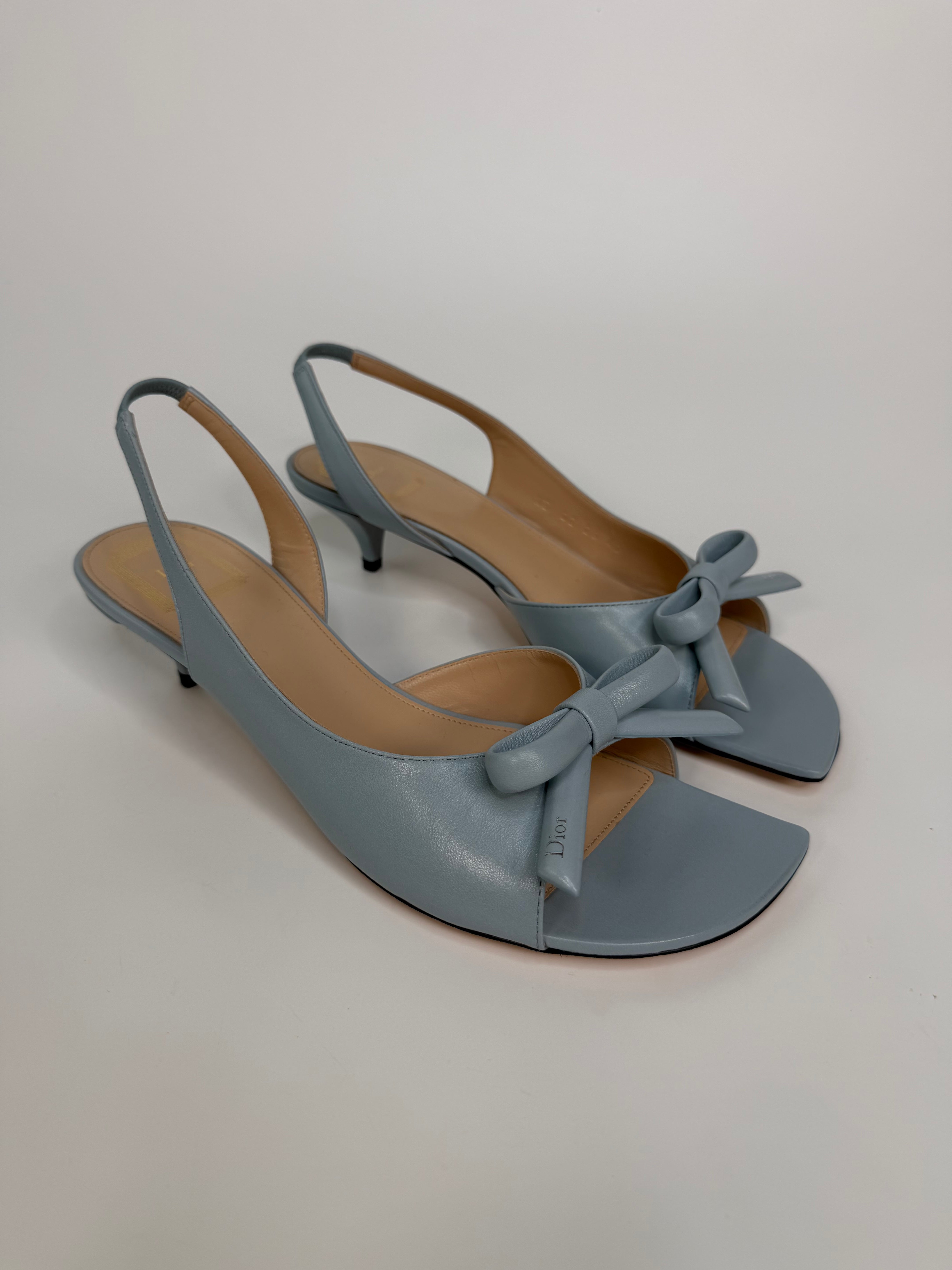 Christian Dior Bow Heeled Slingback Sandals In Blue Lambskin. Authentic and preloved in new and unused condition