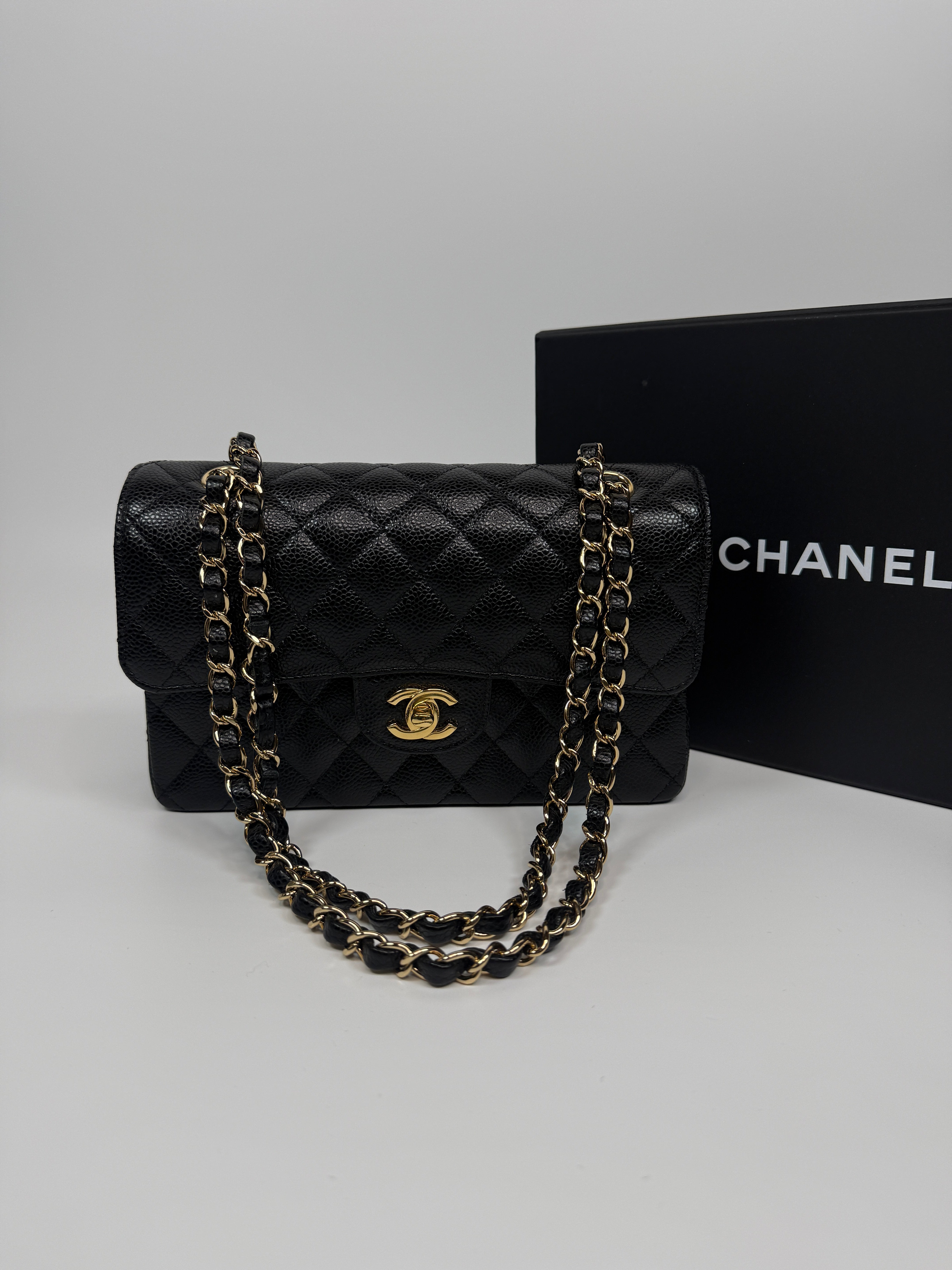 Chanel Small Classic Double Flap In Black Caviar Leather With Gold Hardware Authentic and Preloved In Excellent Condition. 100% Authenticity guarantee 