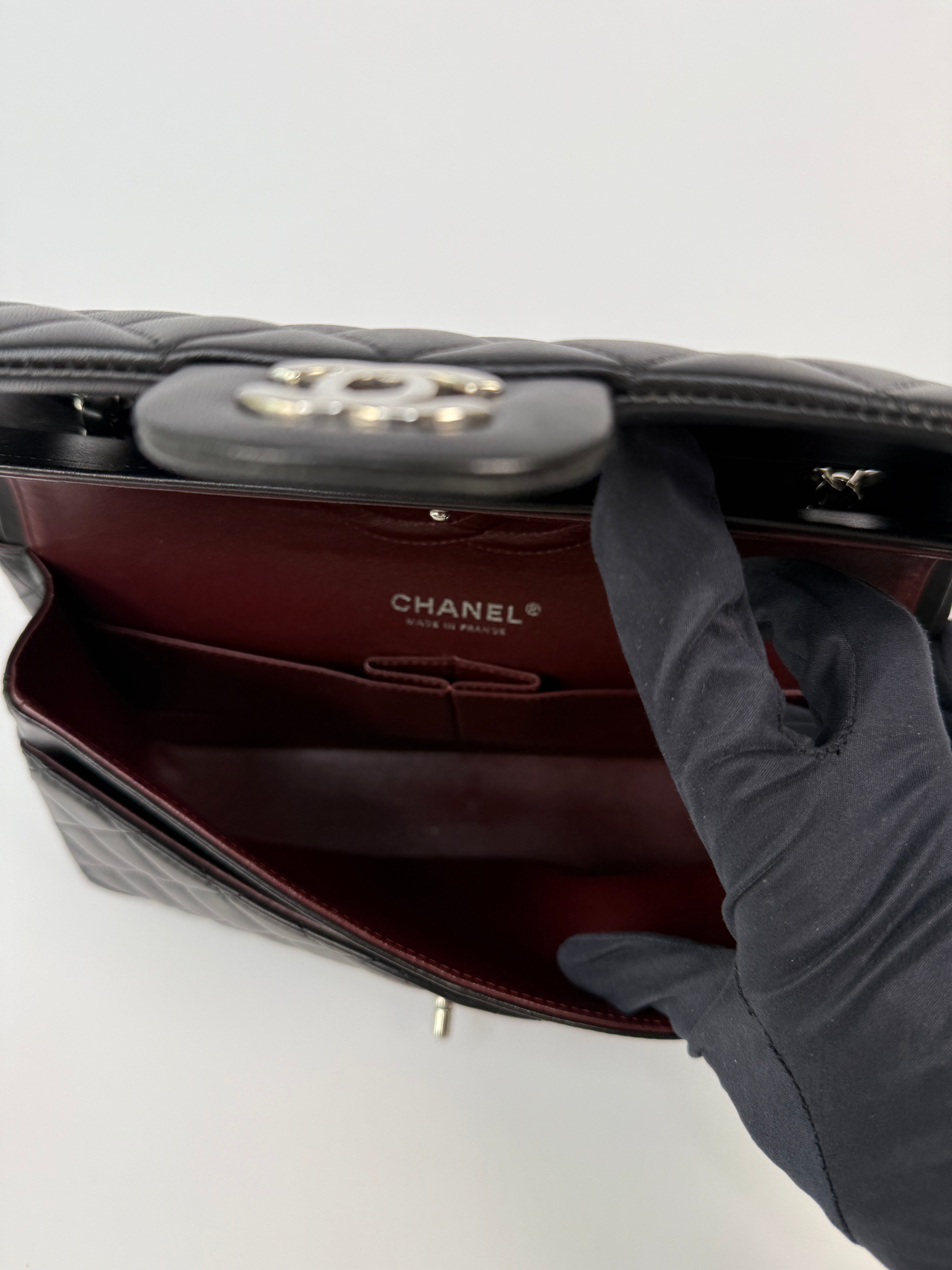 Chanel Medium Classic Double Flap Black Lambskin Leather With Silver Hardware
Pre Loved & Authentic