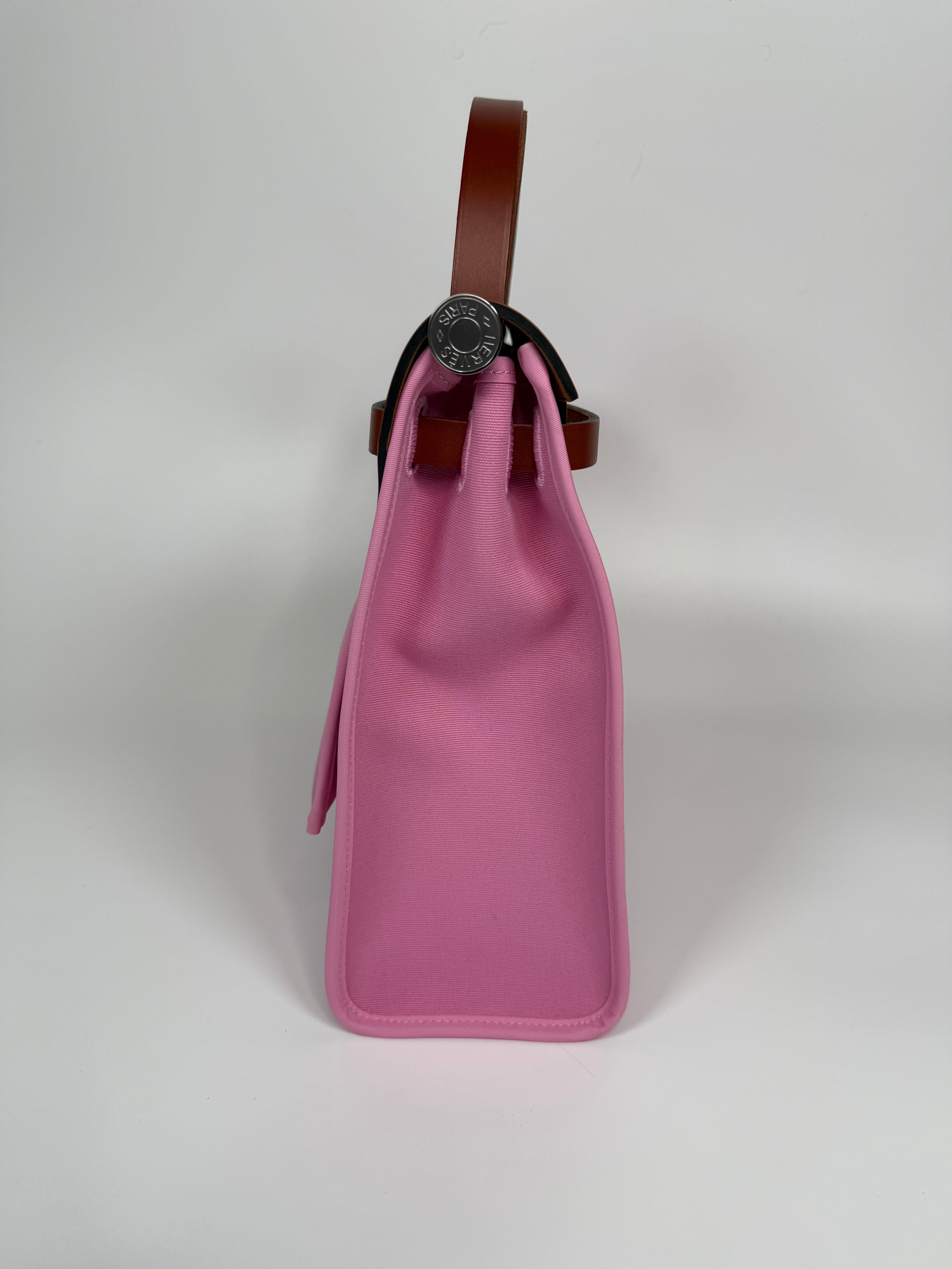 Hermès Herbag 31 Zip In Bubblegum & Cuivre Bag. New and Unused. Authentic and preloved. 100% Authenticity guarantee 