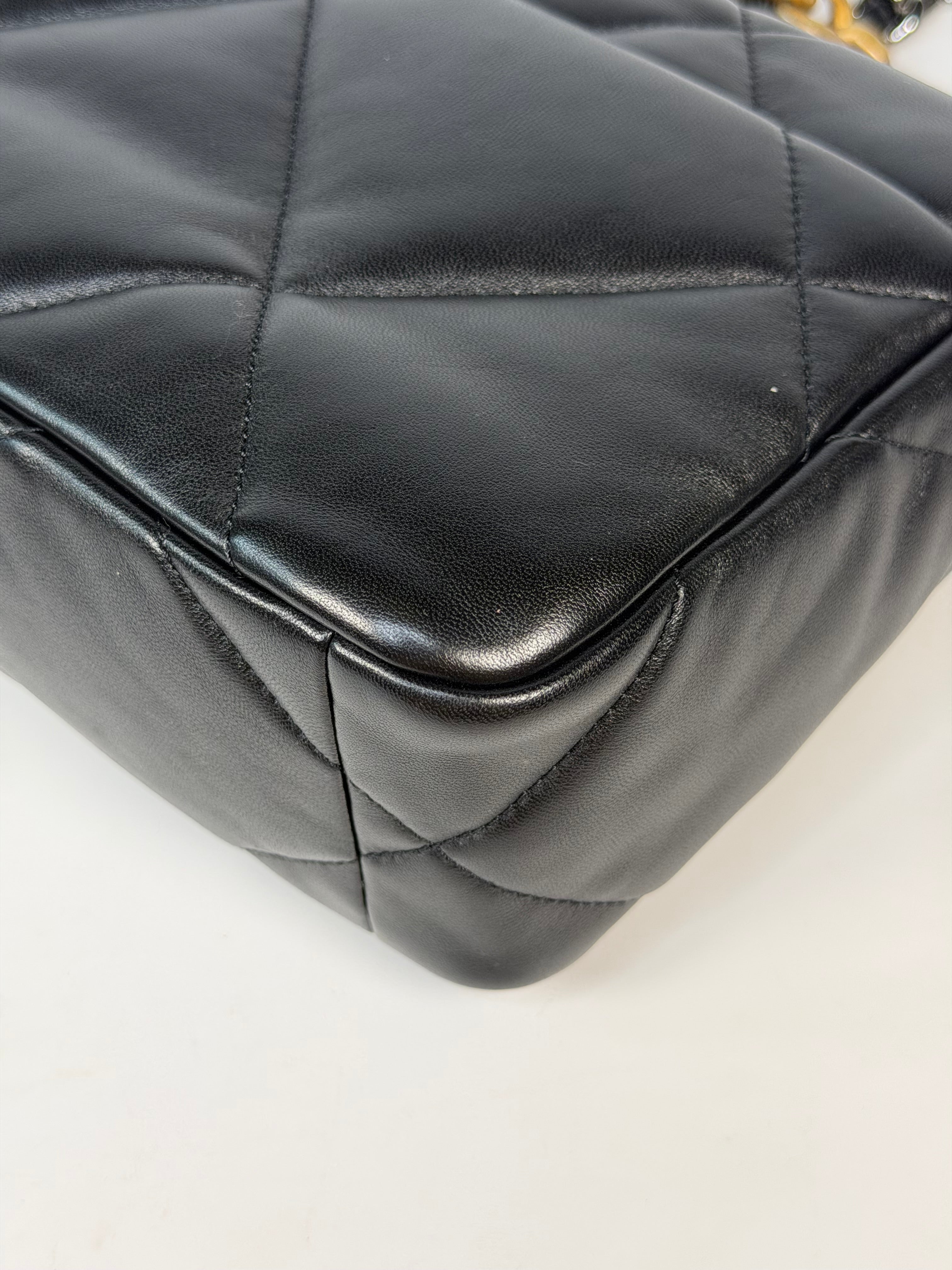 Chanel 19 Small In Black & White Leather With Mixed Hardware. Authentic and preloved in very good condition. Verified by Luxe Cheshire.