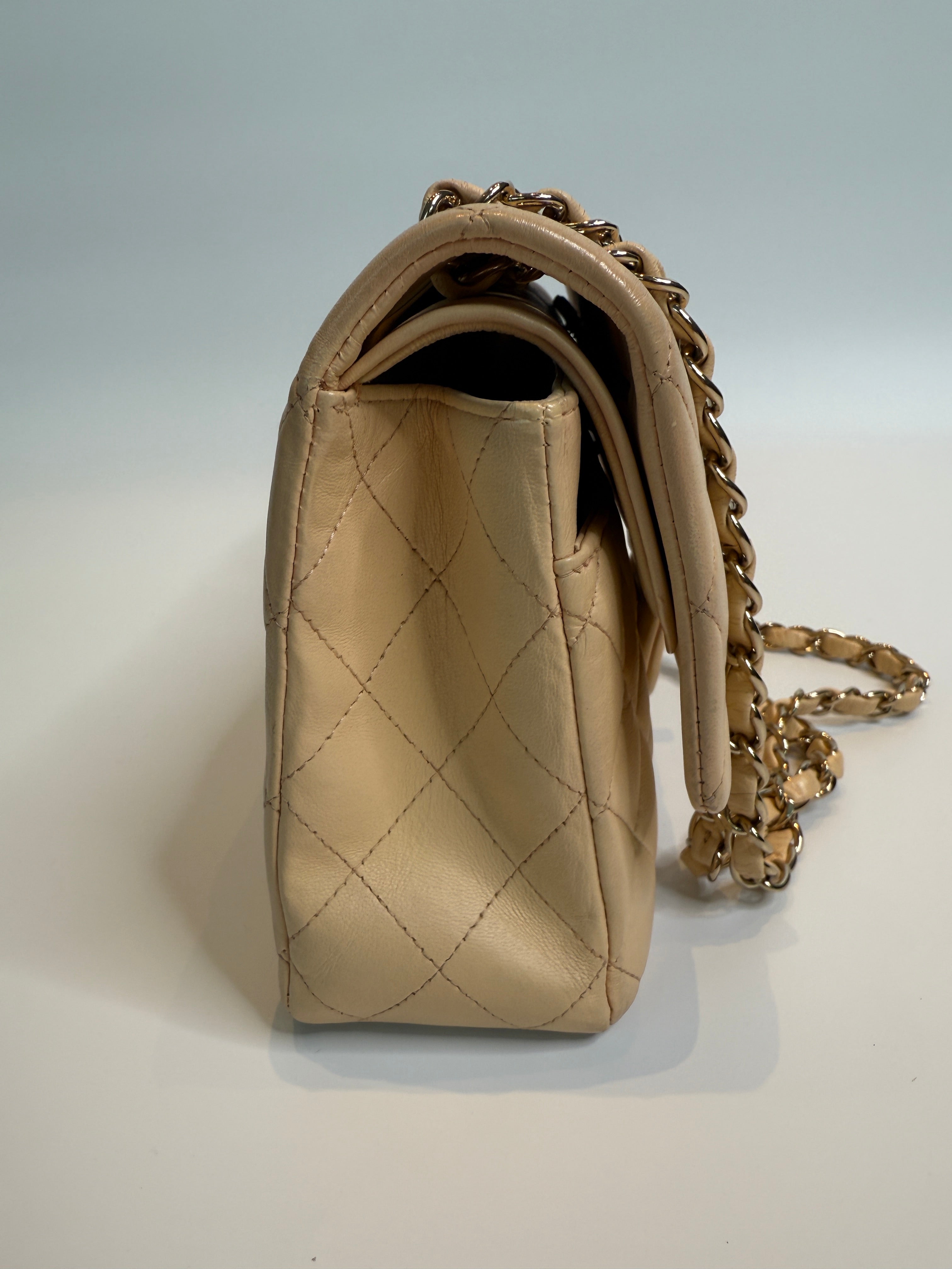 Chanel Medium Classic Double Flap Beige Lambskin Leather With Gold Hardware
Pre Loved & Authentic 