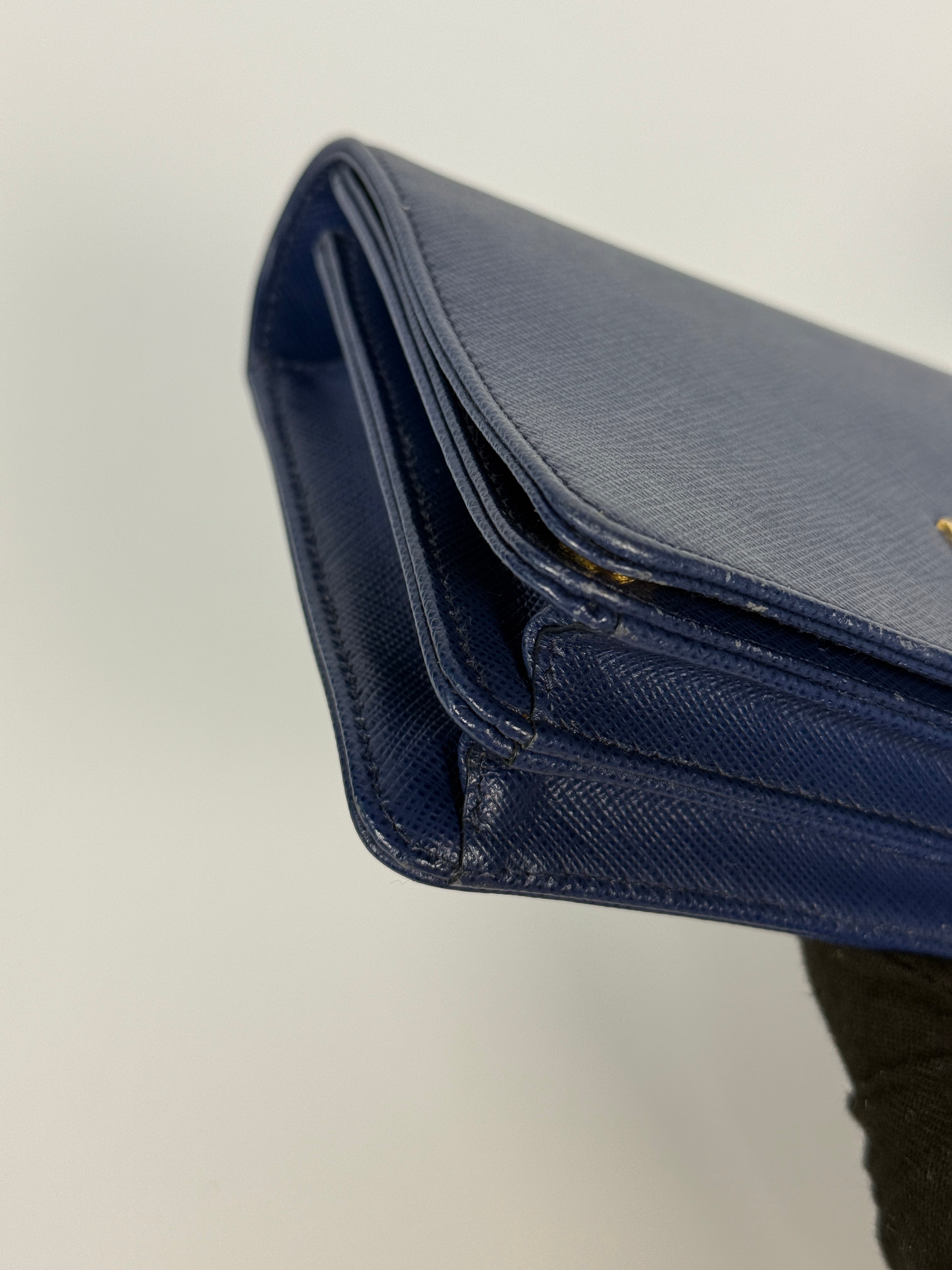 Authentic and preloved Prada Wallet Chain Bag In Blue Saffiano Leather With Gold Hardware. Very Good condition. 100% Authenticity guarantee 