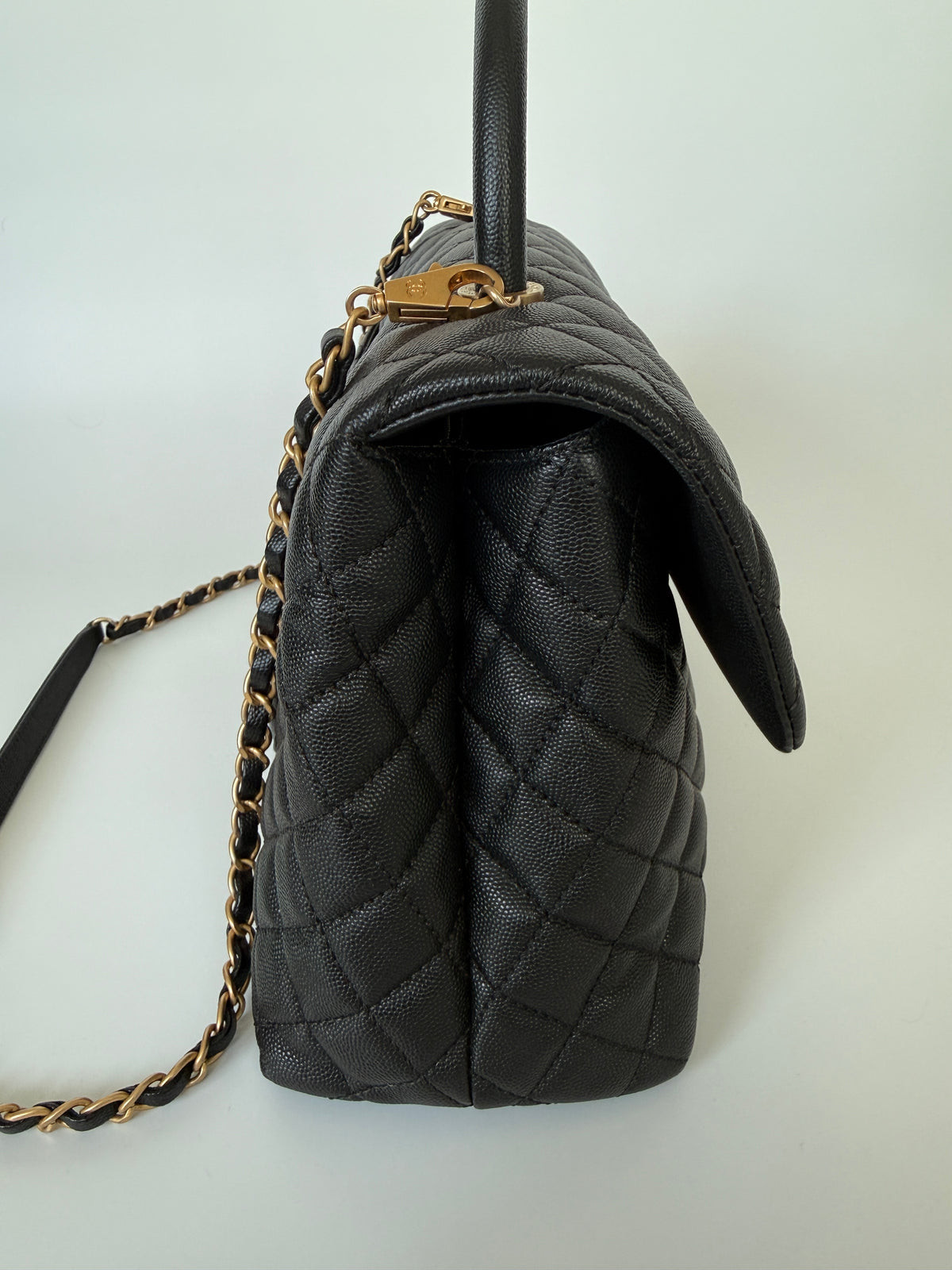 Chanel Coco Large Top Handle In Caviar Leather With Gold Hardware. Verified by Luxe Cheshire. Trusted designer resale.