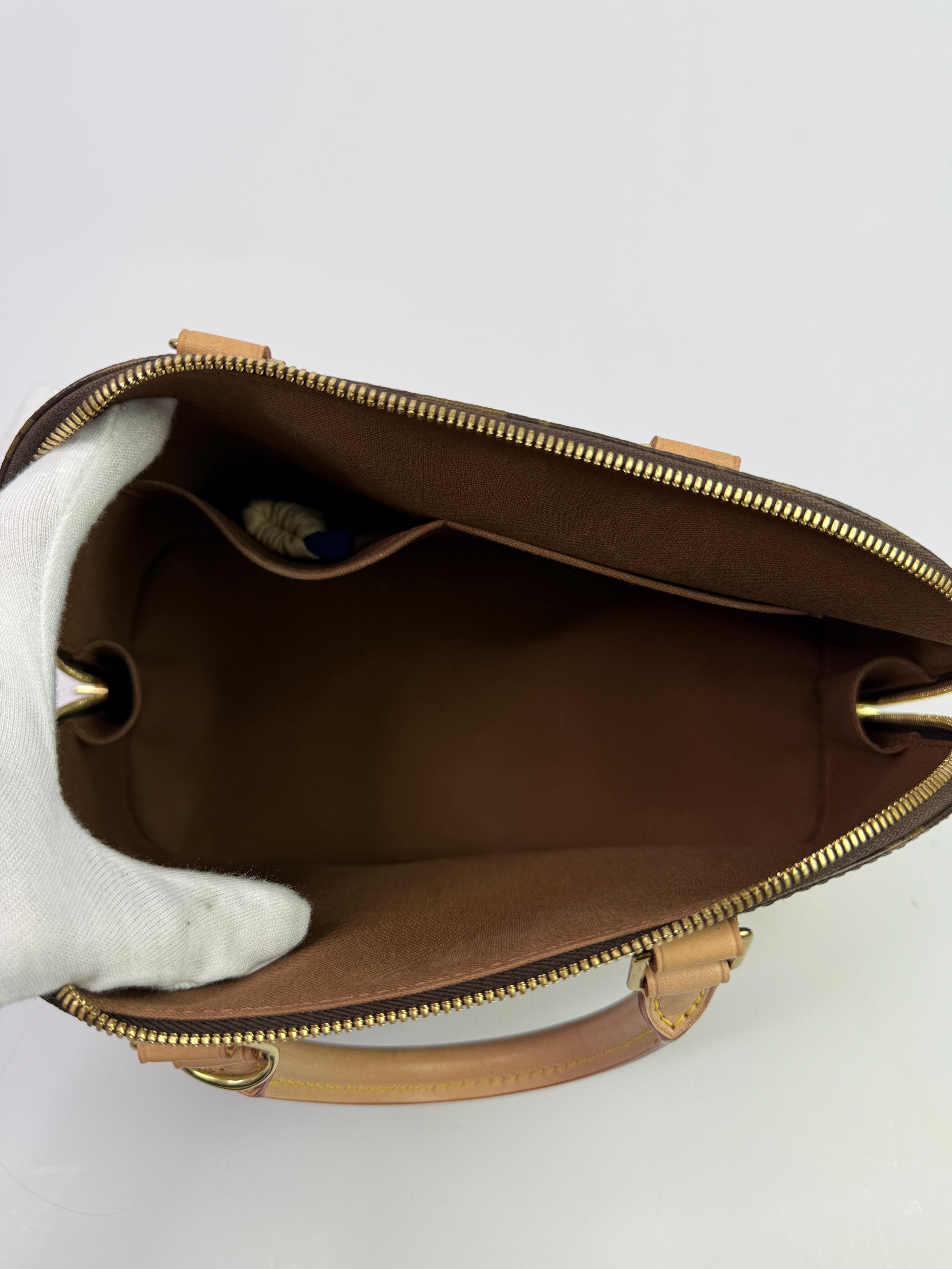 Louis Vuitton Monogram Alma PM Handbag