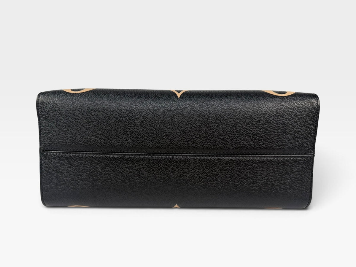Louis Vuitton On The Go MM Tote In Black & Beige Leather With Gold Hardware. 100% authentic and preloved in excellent condition